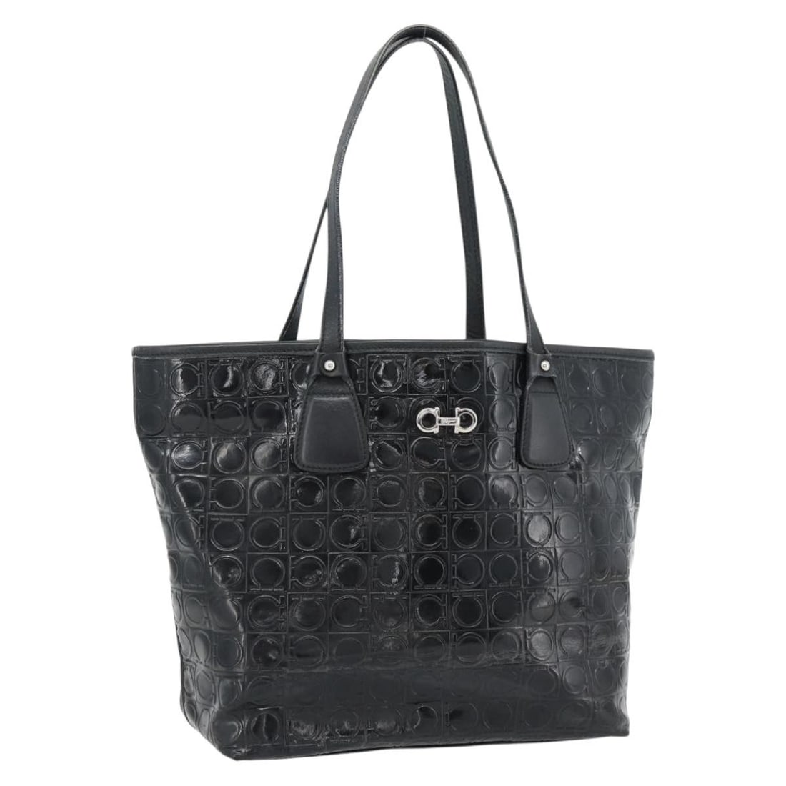 Salvatore Ferragamo Gancini Patent Leather Tote Bag Black: Salvatore Ferragamo Gancini Patent Leather Tote Bag Black Salvatore Ferragamo Gancini Tote in black patent leather. This women's bag is in good overall condition, with rubbing to the exterior leather,