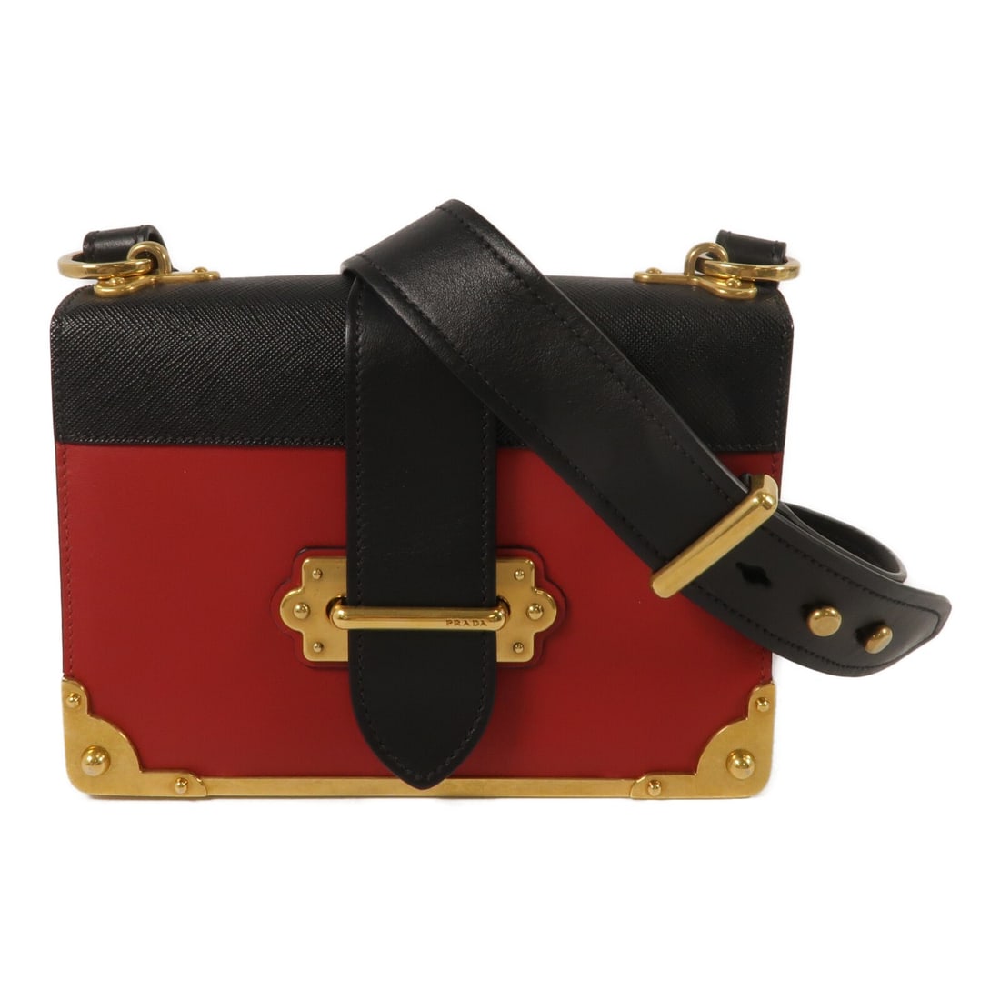 PRADA Red Calfskin Shoulder Bag with Black Accents: PRADA Red Calfskin Shoulder Bag with Black Accents Prada shoulder bag in calfskin (cowhide) leather with a red and black color scheme. It is a women's regular-size bag made in Italy and comes with sto