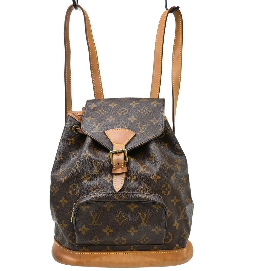 Louis Vuitton Montsouris MM Monogram Canvas Backpack M51136: Louis Vuitton Montsouris MM Monogram Canvas Backpack M51136 Vintage Louis Vuitton Montsouris MM backpack in brown Monogram canvas with leather trim. This medium backpack features a flap buckle and