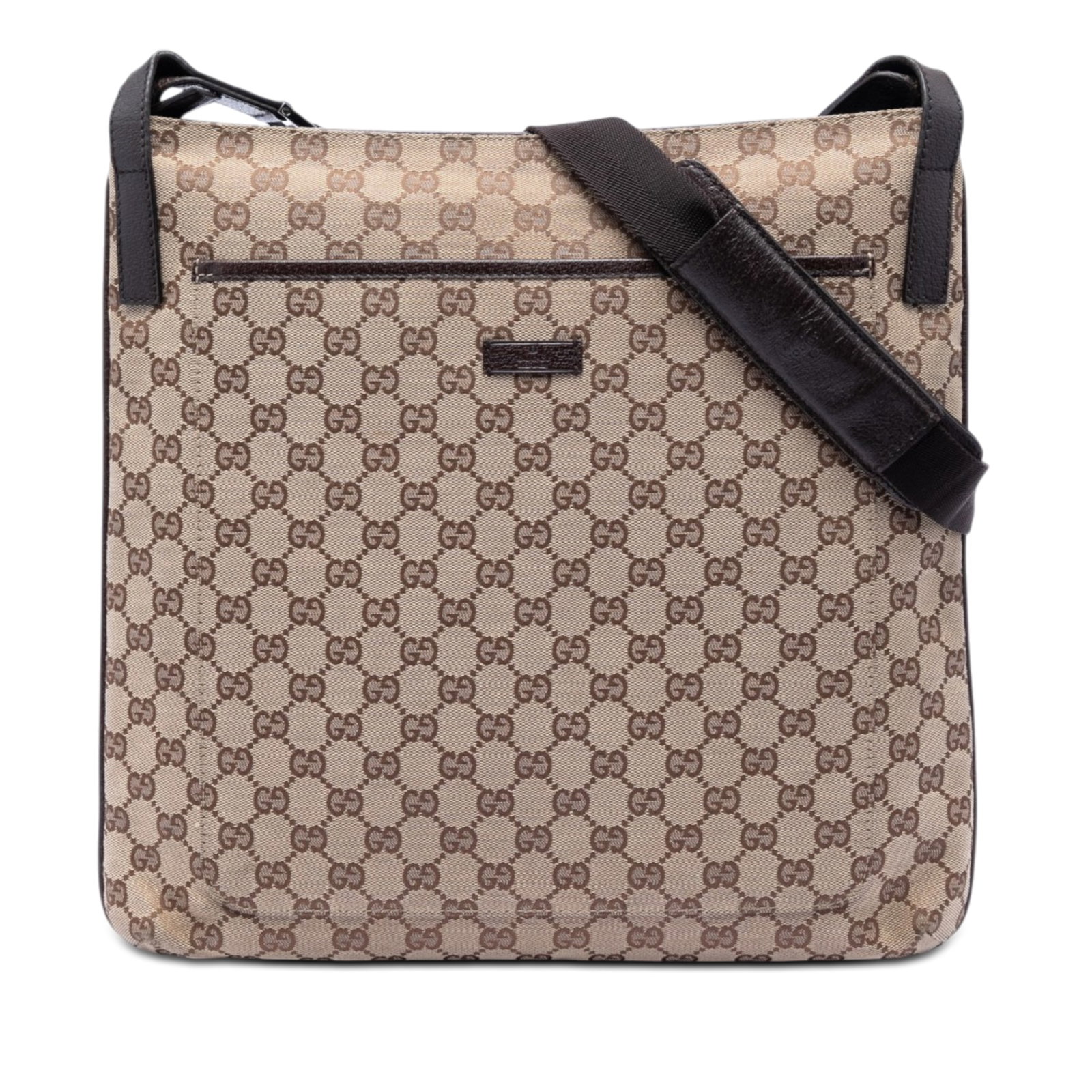 Gucci GG Canvas Beige Crossbody Bag: Gucci GG Canvas Beige Crossbody Bag This Gucci GG Canvas Crossbody bag features a beige canvas body accented with leather trim. It is designed with a front slip pocket, a flat strap for easy carrying,