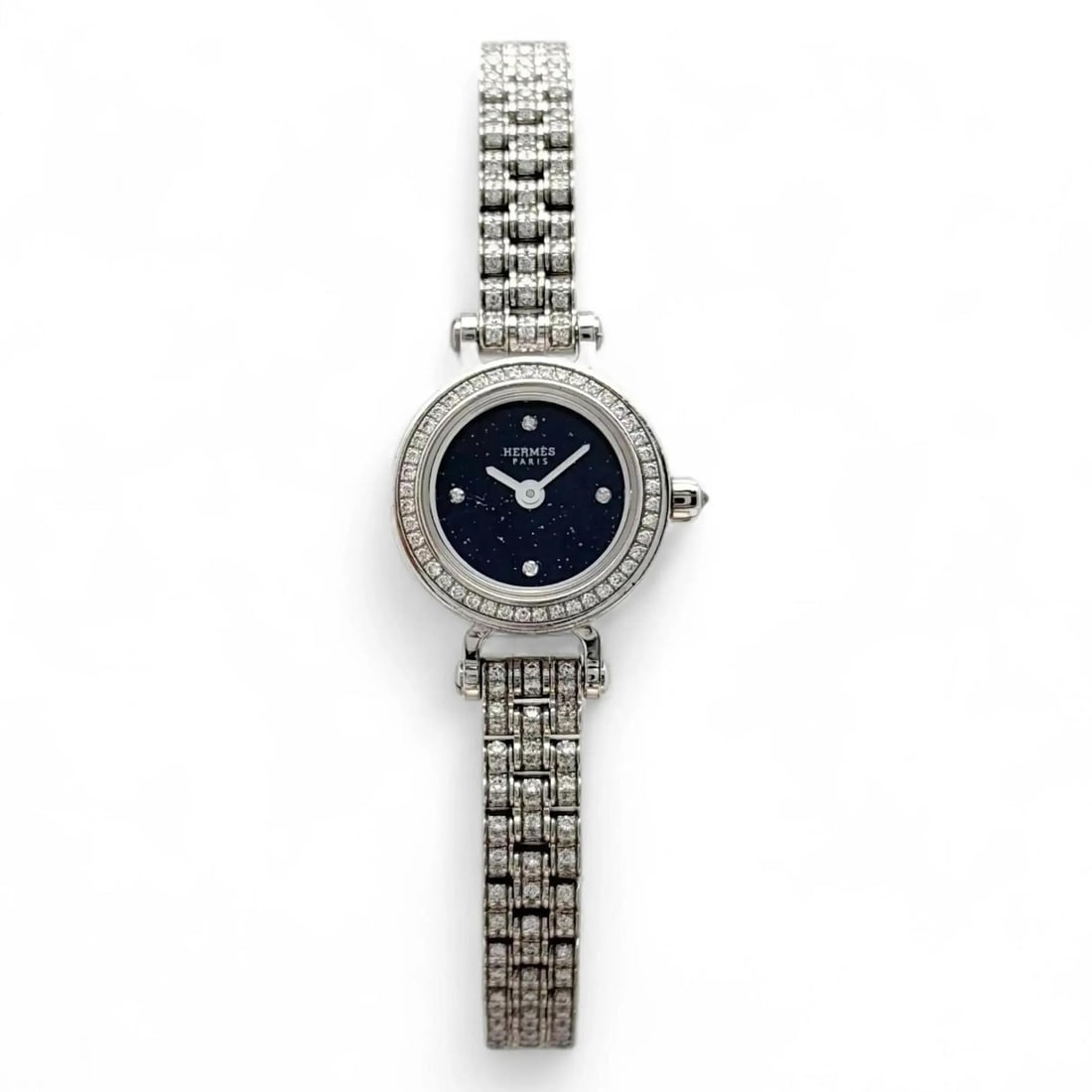 Hermes Faubourg Joaillerie 18K White Gold Diamond Blue Dial Quartz Wristwatch 16.3 mm: Hermes Faubourg Joaillerie 18K White Gold Diamond Blue Dial Quartz Wristwatch 16.3 mm This Hermes Faubourg Joaillerie wristwatch features a 16.3 mm round case crafted from white gold and a stunning bl