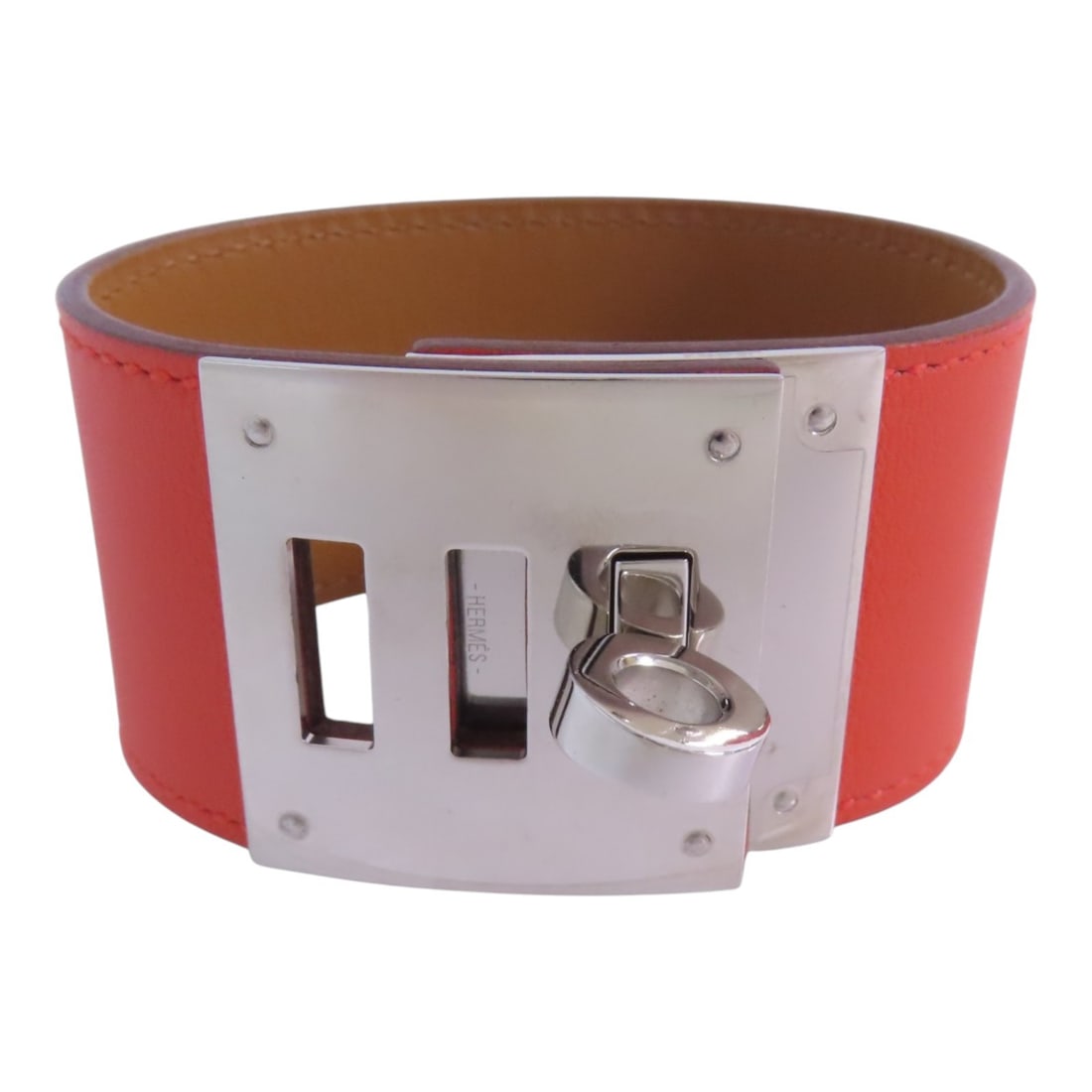 HERMES Kerry Dog Bracelet Orange Swift Leather PHW: HERMES Kerry Dog Bracelet Orange Swift Leather PHW Hermes PHW Kerry Dog Bracelet Bangle in Orange Swift leather with calfskin (cowhide) and metal accents. This women's bracelet is identified as model 