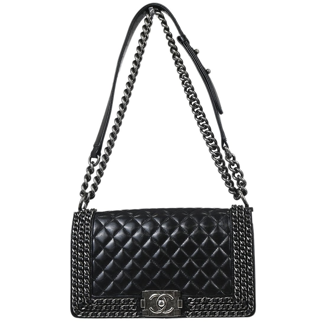 Chanel Boy Flap quilted calfskin handbag: Chanel Boy Flap quilted calfskin handbag This Chanel Boy Flap Bag features a quilted glazed calfskin leather exterior in black, offering a sophisticated and timeless look. Designed for women, the bag 