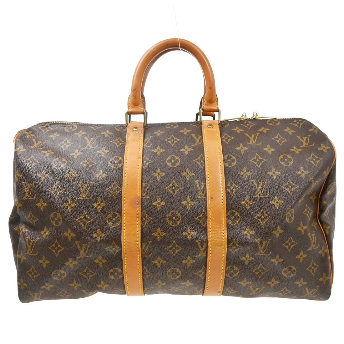 Louis Vuitton Keepall Unisex Brown Canvas Travel Bag: Louis Vuitton Keepall Unisex Brown Canvas Travel Bag Louis Vuitton Keepall in brown monogram canvas. This unisex bag is in good condition with visible wear, including scuffs, scratches, and cracks on 