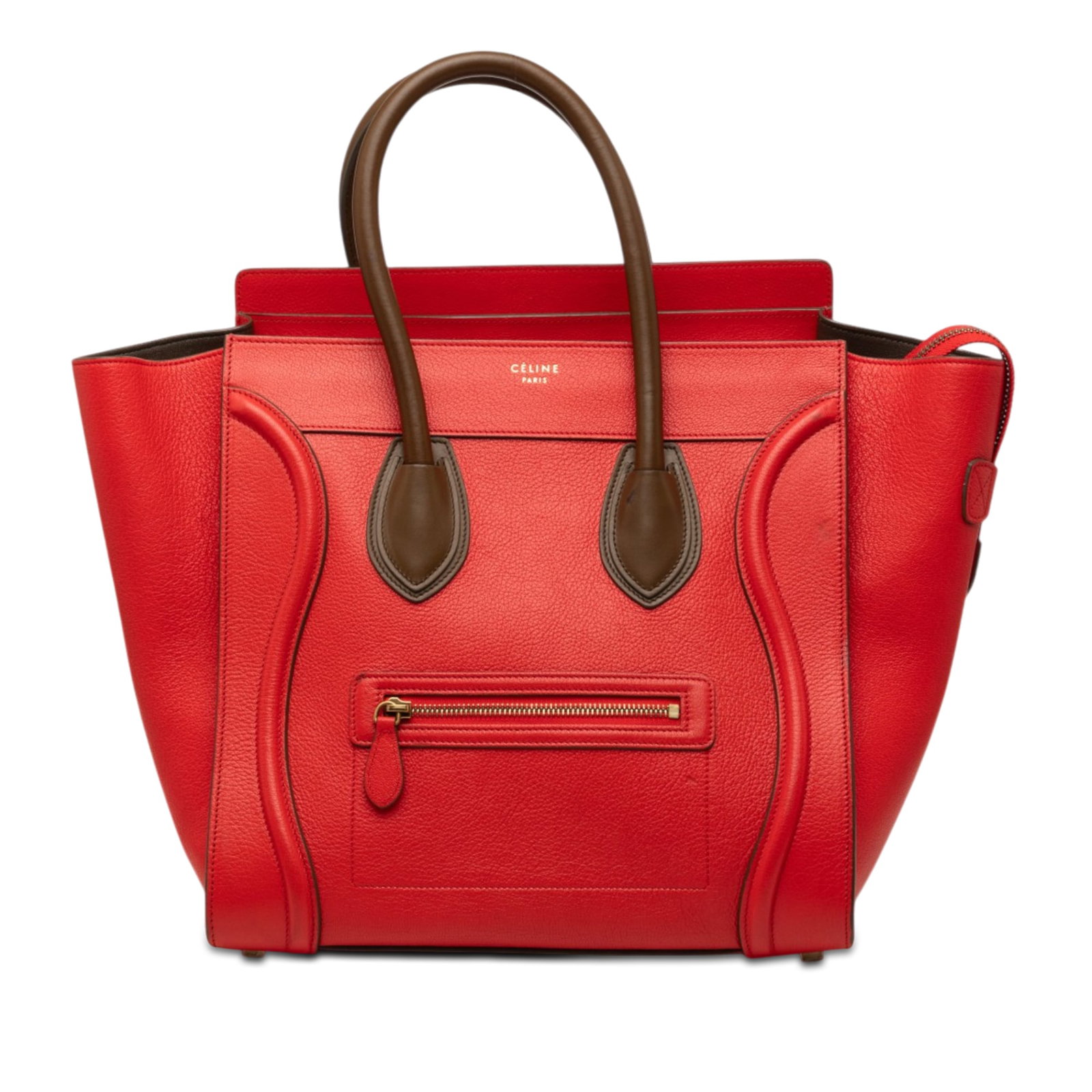 Celine Mini Luggage Tote in Red Bicolor Leather: Celine Mini Luggage Tote in Red Bicolor Leather Celine Mini Bicolor Leather Luggage Tote crafted in leather with rolled leather handles, a top zip closure, an exterior front zip pocket, and interior z