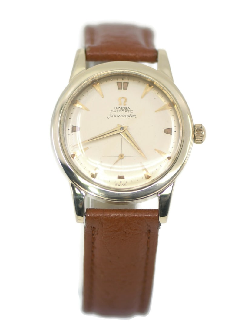 Authentic Omega Seamaster 14K Gold Filled Watch 6012 34MM: Authentic Omega Seamaster 14K Gold Filled Watch 6012 34MM This Omega Seamaster wristwatch showcases a classic design with a luxurious touch. The watch features a mechanical (automatic) movement, ensur