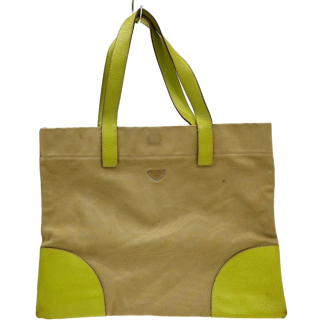 PRADA 31 Medium Tote Bag Beige Canvas Green Handles: PRADA 31 Medium Tote Bag Beige Canvas Green Handles Vintage Prada tote handbag in beige canvas with green handles and logo accents. This women's medium bag is made in Italy and features an interior zi
