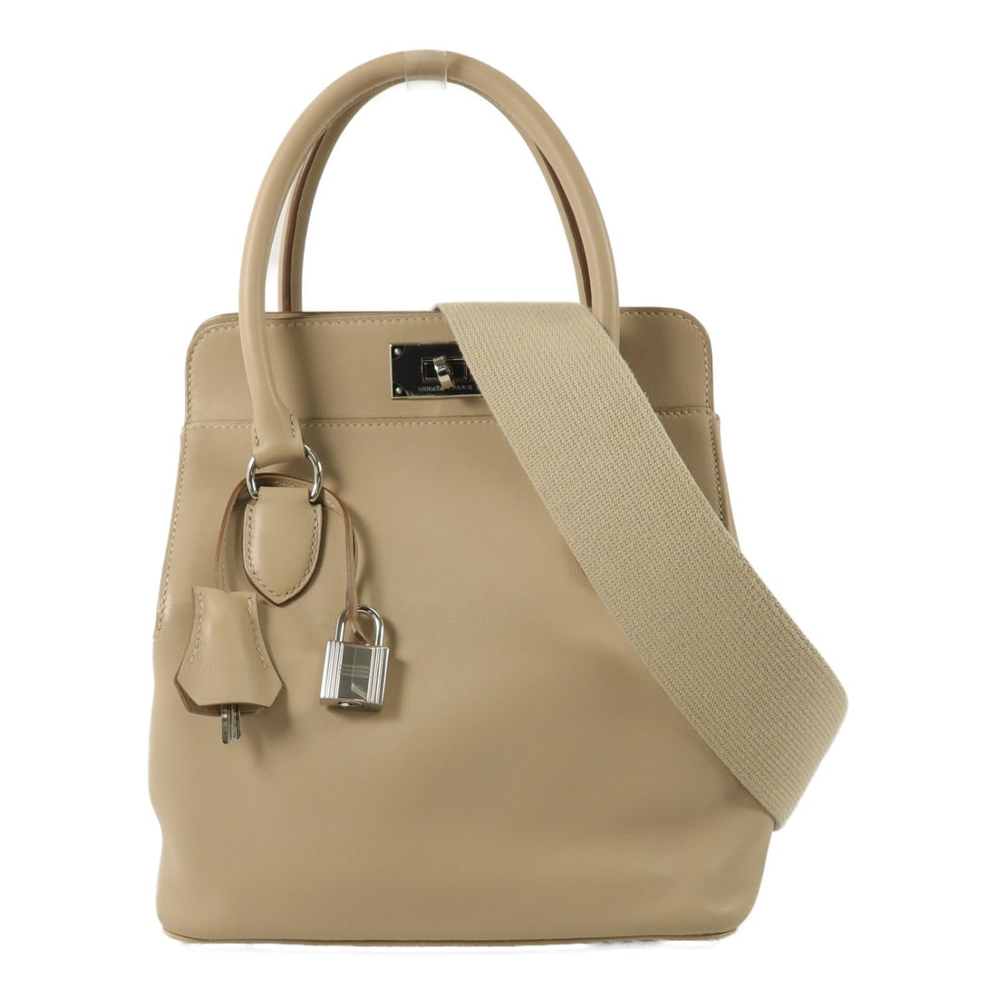 Hermes Toolbox 20 Veau Swift 2way Shoulder Bag Argile PHW: Hermes Toolbox 20 Veau Swift 2way Shoulder Bag Argile PHW Hermes Toolbox 20 2way shoulder bag in Argile Veau Swift leather with palladium-tone hardware. This women's bag is made in France and features