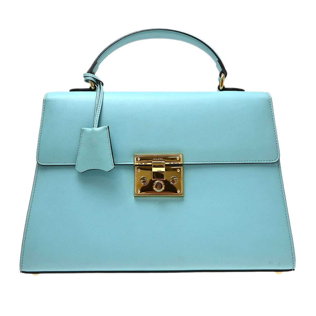 Gucci medium blue leather tote handbag with keys 432674 520981: Gucci medium blue leather tote handbag with keys 432674 520981 Vintage Gucci light blue leather tote handbag for women. This medium-sized bag features a brown lining, leather handles, one interior zip