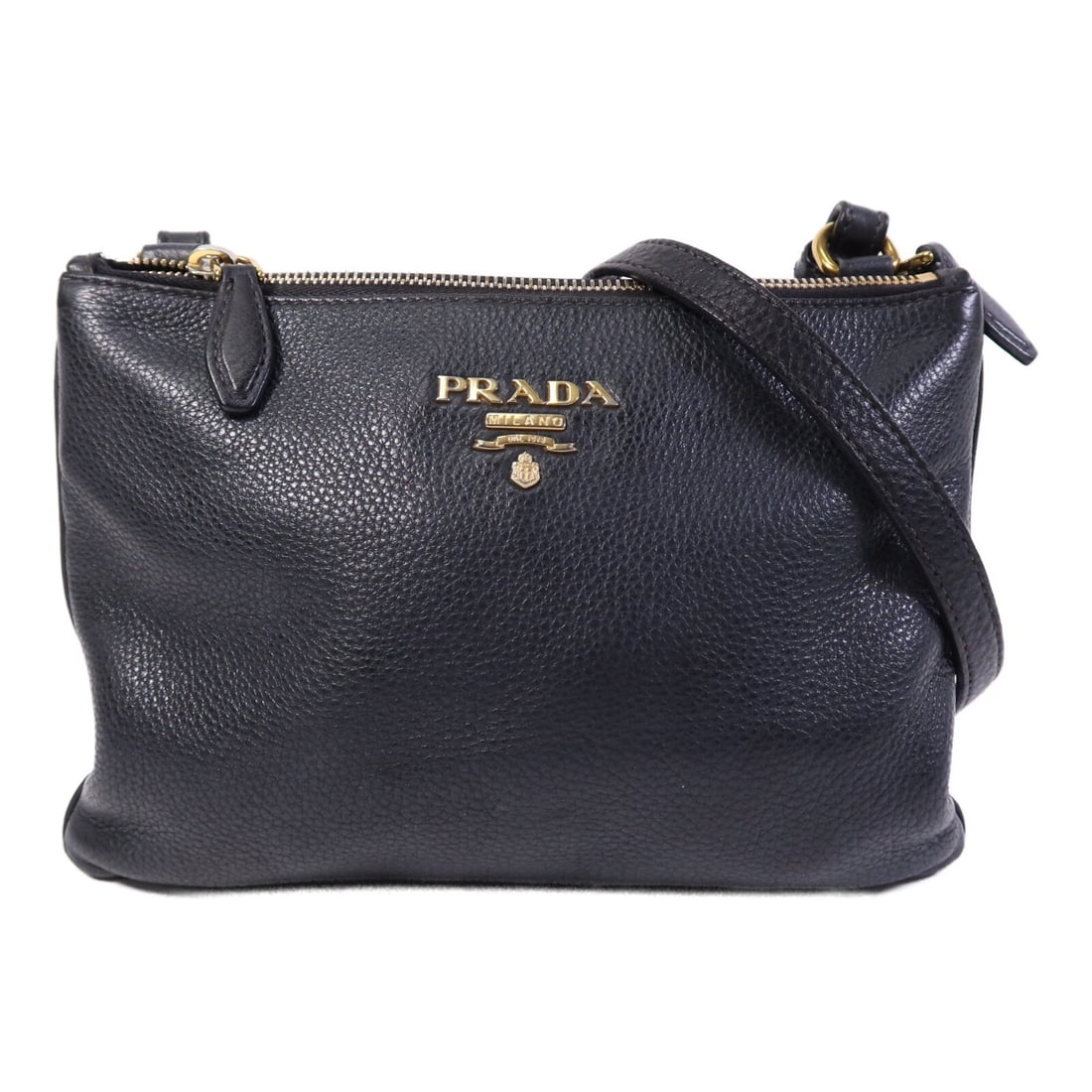 Prada 1BH046 black calfskin leather shoulder bag: Prada 1BH046 black calfskin leather shoulder bag Prada shoulder bag in black calfskin (cowhide) leather, made in Italy. It features a black frame color, shoulder strap length of 111-121 cm, and an int