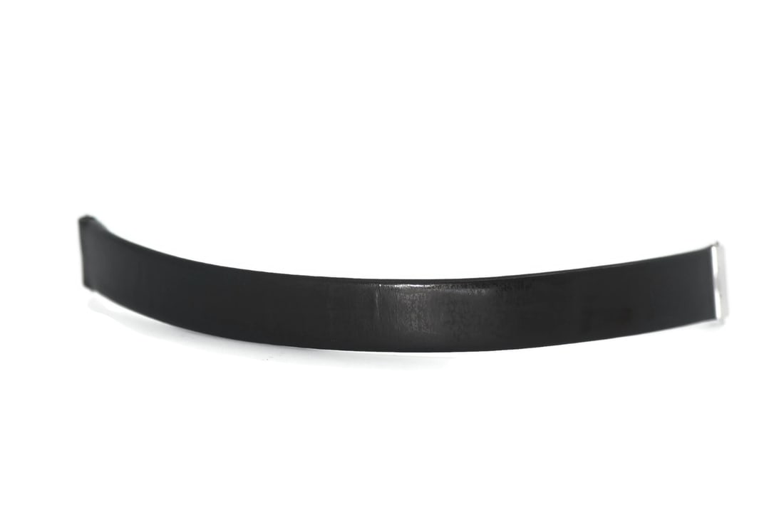 Black Satin Wristwatch Band 13mm Width by Piaget: Black Satin Wristwatch Band 13mm Width by Piaget This is a pre-owned Piaget black satin wristwatch strap, designed with a 13 mm band width and a length of 6 inches. Made in Switzerland, it offers a re