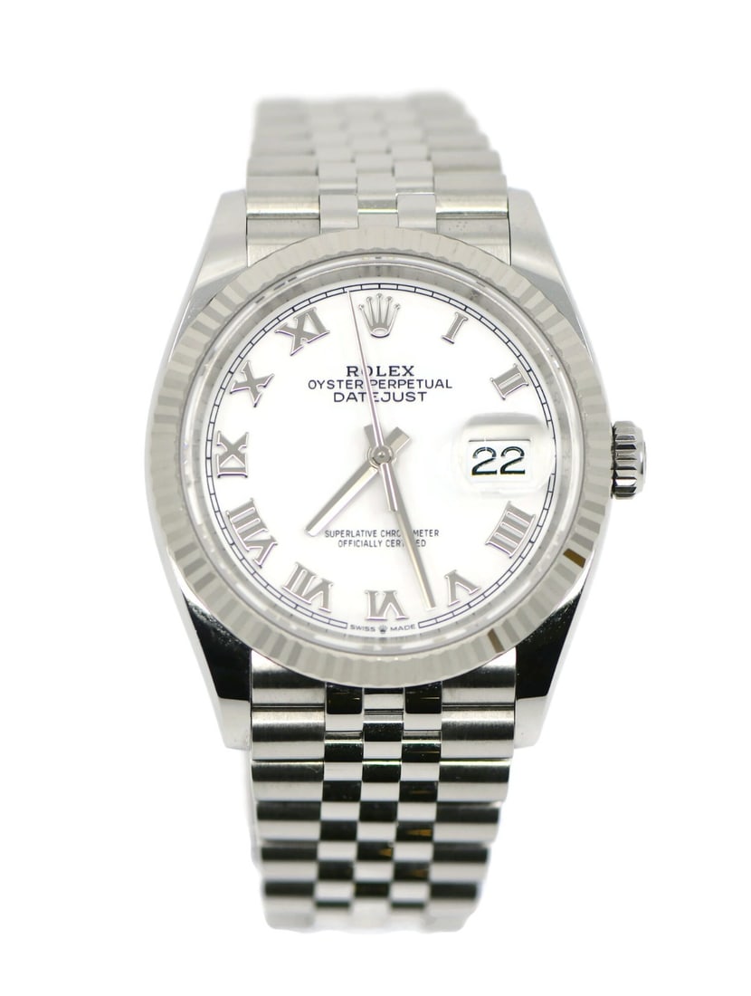 Rolex Datejust 36 Stainless Steel Watch Ref 126234 with Box and Papers: Rolex Datejust 36 Stainless Steel Watch Ref 126234 with Box and Papers Experience timeless elegance with this pre-owned Rolex Datejust 36 wristwatch, model reference 126234. Crafted from high-quality 