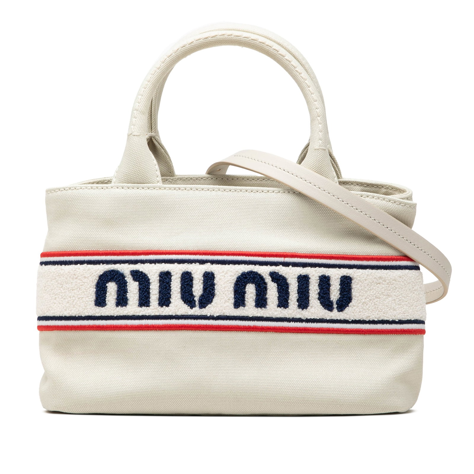 Miu Miu Logo Canvas Satchel with Leather Strap and Handles: Miu Miu Logo Canvas Satchel with Leather Strap and Handles Convertible Miu Miu tote in embroidered canvas with cotton trim and logo detailing. It features rolled leather handles, an adjustable and det