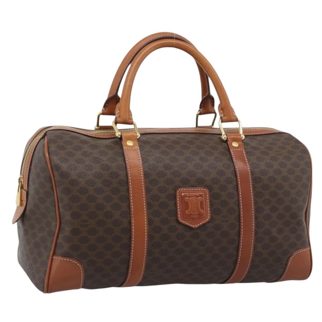 CELINE Macadam Boston Bag Brown PVC Leather Gold Tone: CELINE Macadam Boston Bag Brown PVC Leather Gold Tone Authentic CELINE Macadam canvas Boston bag in brown with gold-tone accents. This women's bag is made in Italy from PVC leather and Macadam canvas.
