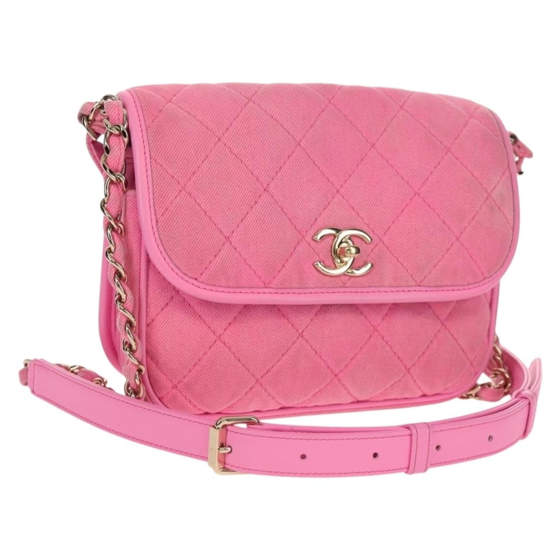 Pink Canvas Flap Messenger Shoulder Bag by Chanel Matelasse: Pink Canvas Flap Messenger Shoulder Bag by Chanel Matelasse This Chanel Flap Messenger Bag features a quilted pink canvas design and a chain shoulder strap. The bag is pre-owned and in good condition,