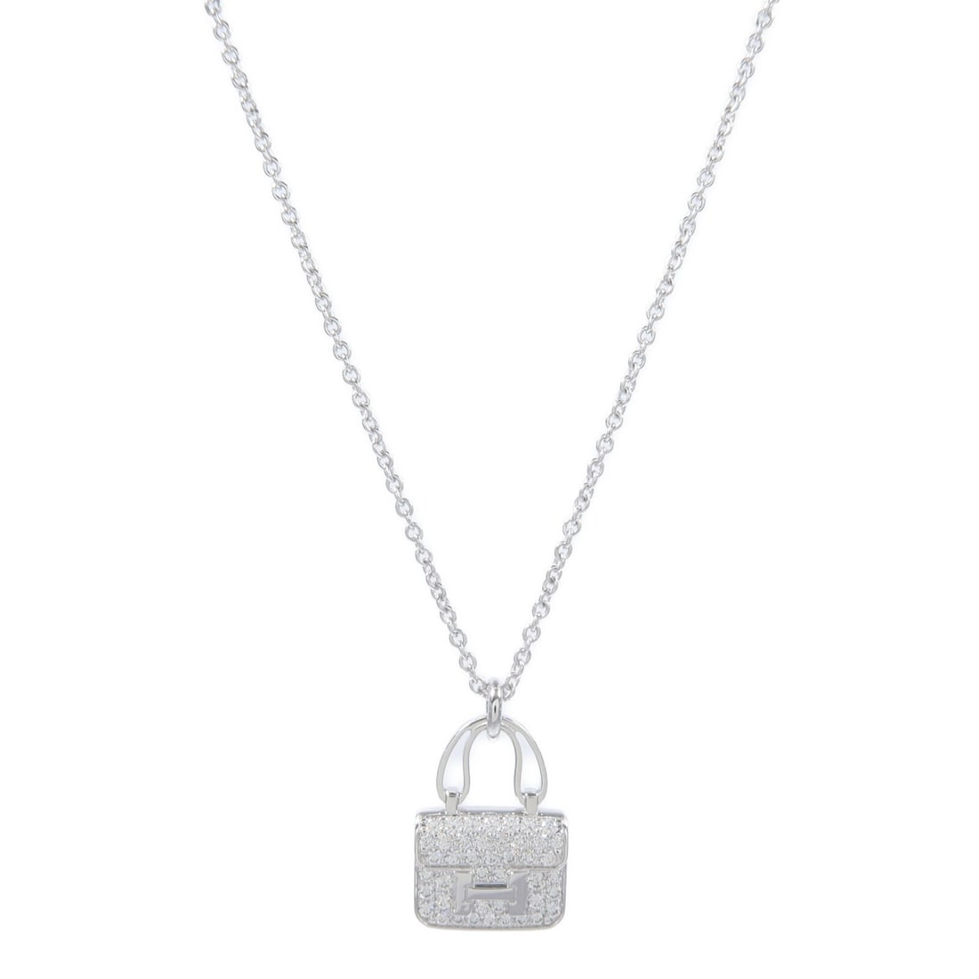 Hermes Amulettes Constance diamond necklace in 18K white gold: Hermes Amulettes Constance diamond necklace in 18K white gold Hermes Amulettes Constance pendant necklace crafted in 18K white gold and set with diamond accents. Made in France, this women's necklace 