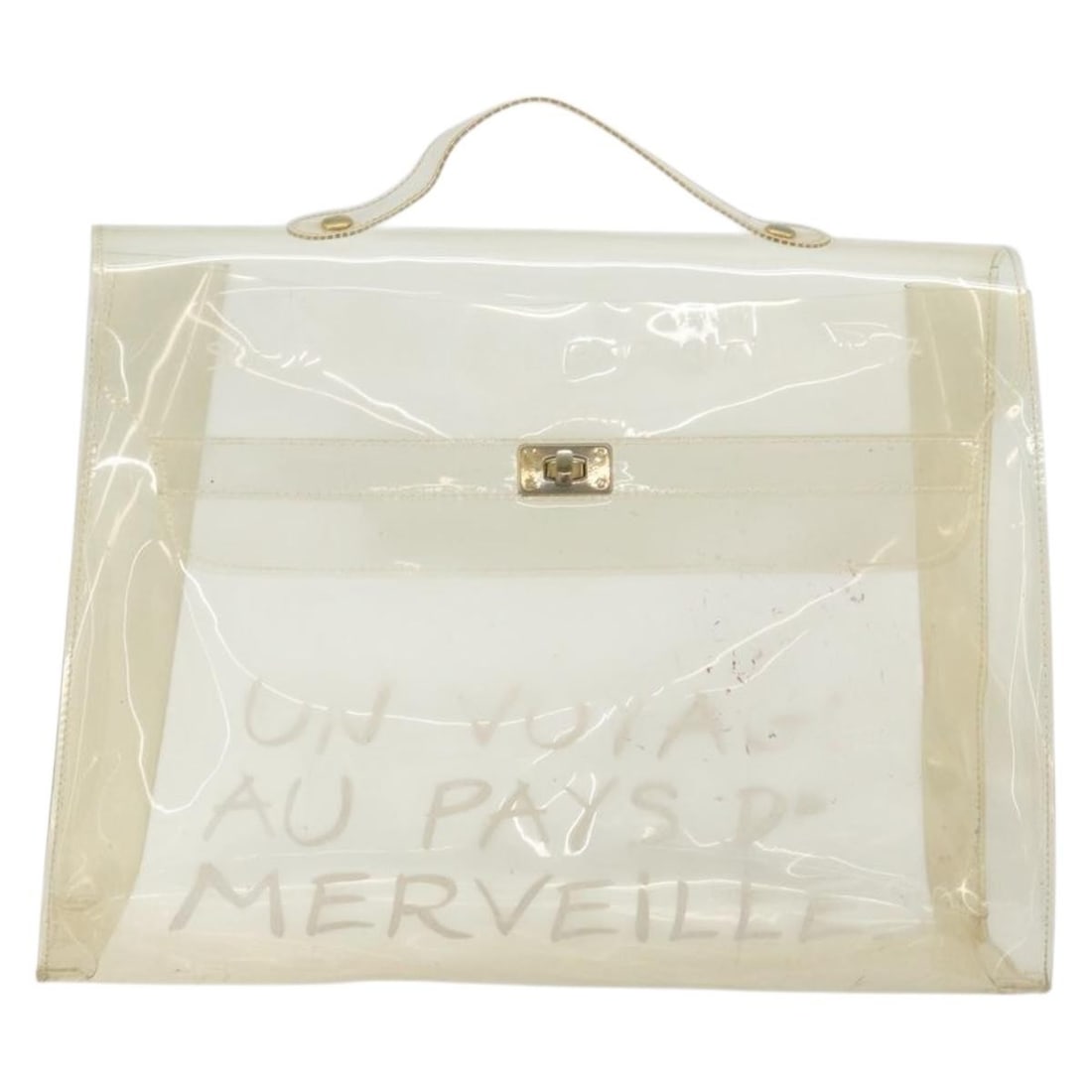Hermes Kelly Souvenir clear plastic handbag: Hermes Kelly Souvenir clear plastic handbag The Hermes Kelly Souvenir Bag is a clear vinyl handbag designed for women. Made from plastic, this bag features the iconic Kelly silhouette and originates f