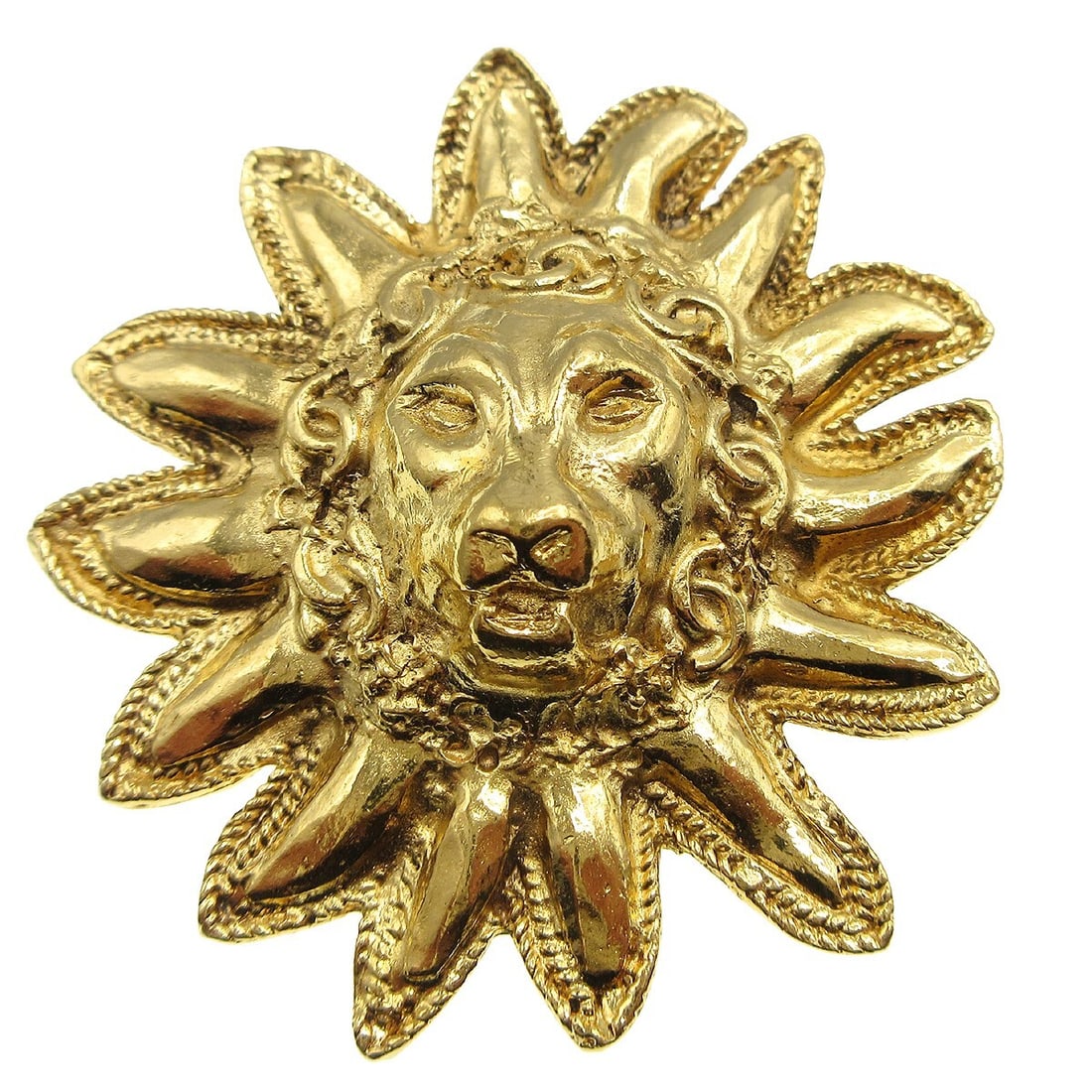 Chanel Gold Tone Lion Head Logo Brooch Pin: Chanel Gold Tone Lion Head Logo Brooch Pin Gold-tone Chanel brooch featuring a lion motif with CC logo detailing. Made in France, this brooch has a bold decorative design and is presented in good to v