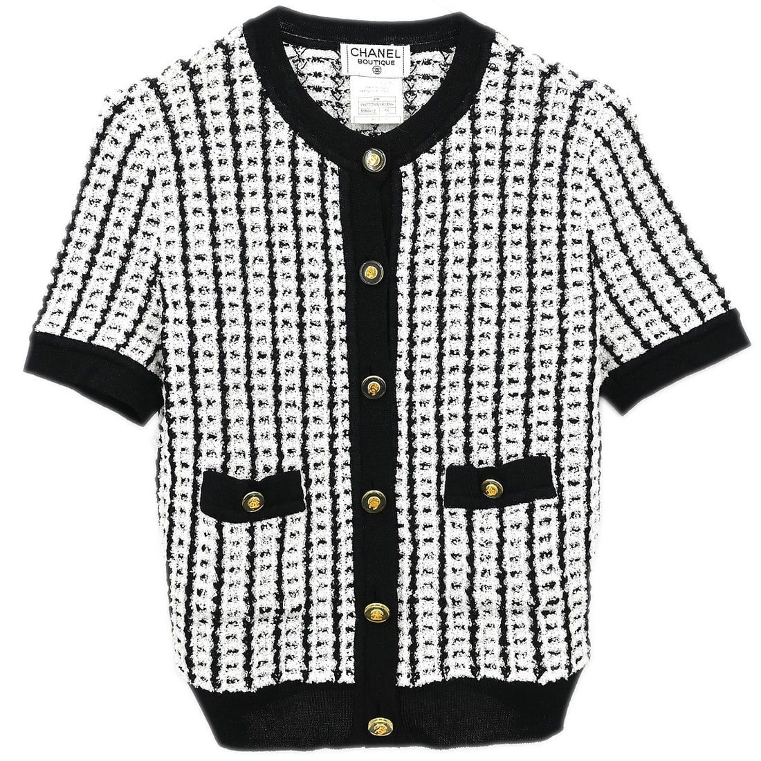 CHANEL White Black Knit Short Sleeve Top Size 38: CHANEL White Black Knit Short Sleeve Top Size 38 Chanel short sleeve knit sweater top in white and black with a round neckline, regular fit, and two exterior pockets. Made in Italy for women in size 3