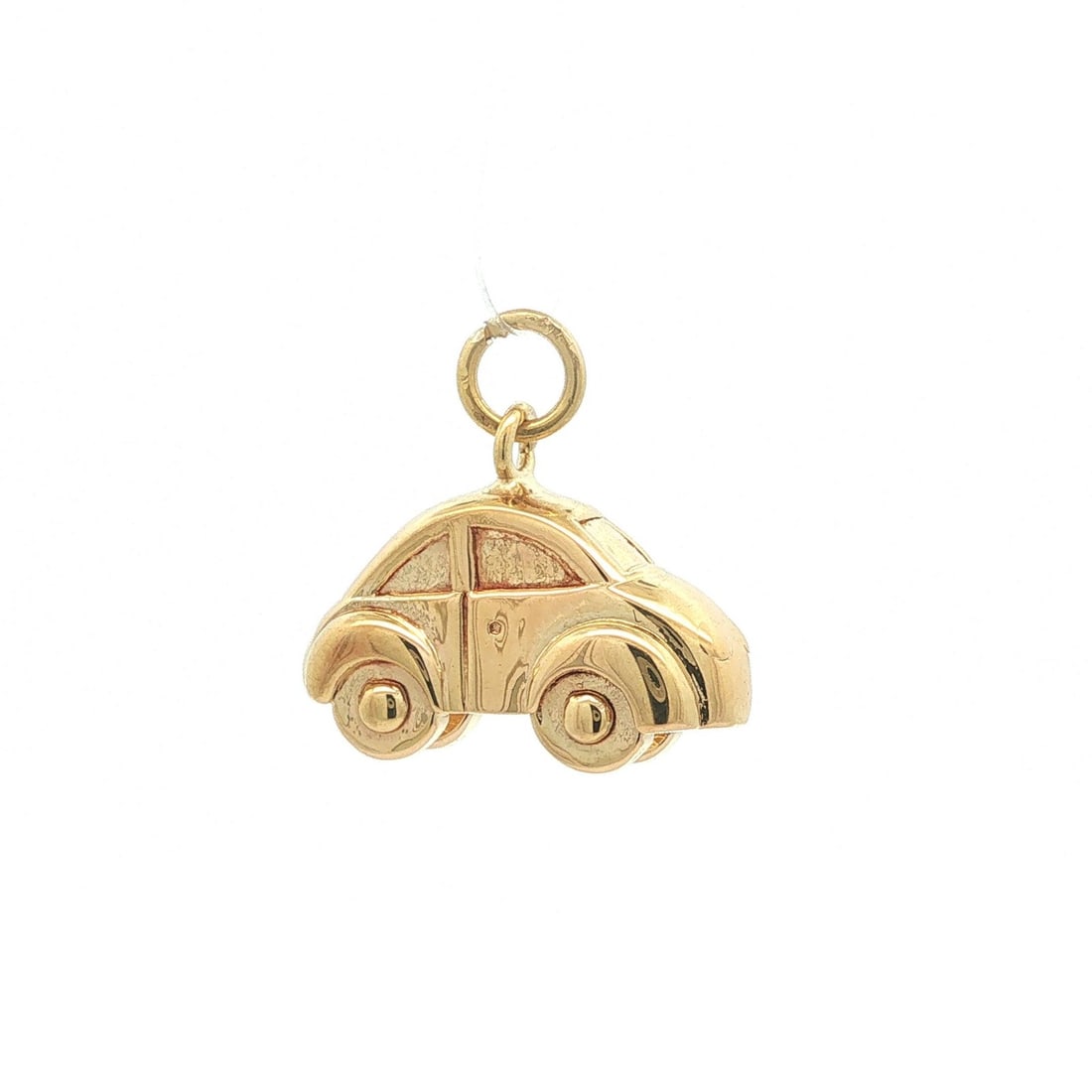 Unbranded 18k Yellow Gold Beetle Car Charm Pendant with Bail: Unbranded 18k Yellow Gold Beetle Car Charm Pendant with Bail Vintage puffed beetle car charm pendant crafted in solid 18k yellow gold. This collectible pendant features a bail and has no stone. It is 
