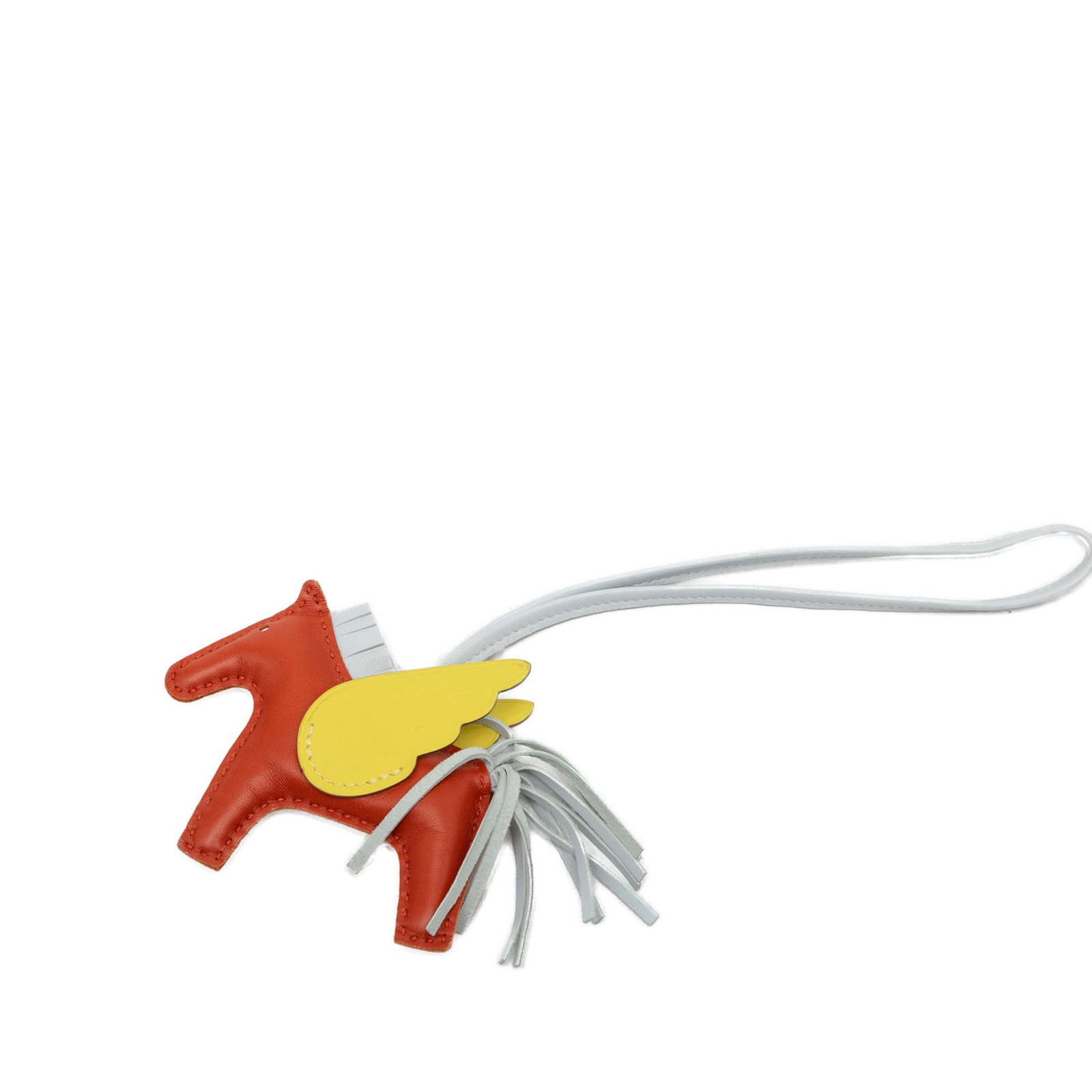 Hermes Rodeo Pegase PM bag charm in Milo lambskin and Swift leather: Hermes Rodeo Pegase PM bag charm in Milo lambskin and Swift leather Hermes Grigri Rodeo Pegase PM bag charm crafted in Milo lambskin and Swift leather. This accessory includes a flat leather strap and