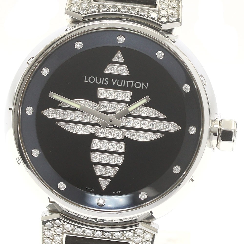 Louis Vuitton Tambour Forever Q13MB womens quartz diamond watch: Louis Vuitton Tambour Forever Q13MB womens quartz diamond watch Pre-owned Louis Vuitton Tambour Forever women's wristwatch with a quartz movement and 12P diamond lug design. This Swiss-made watch feat
