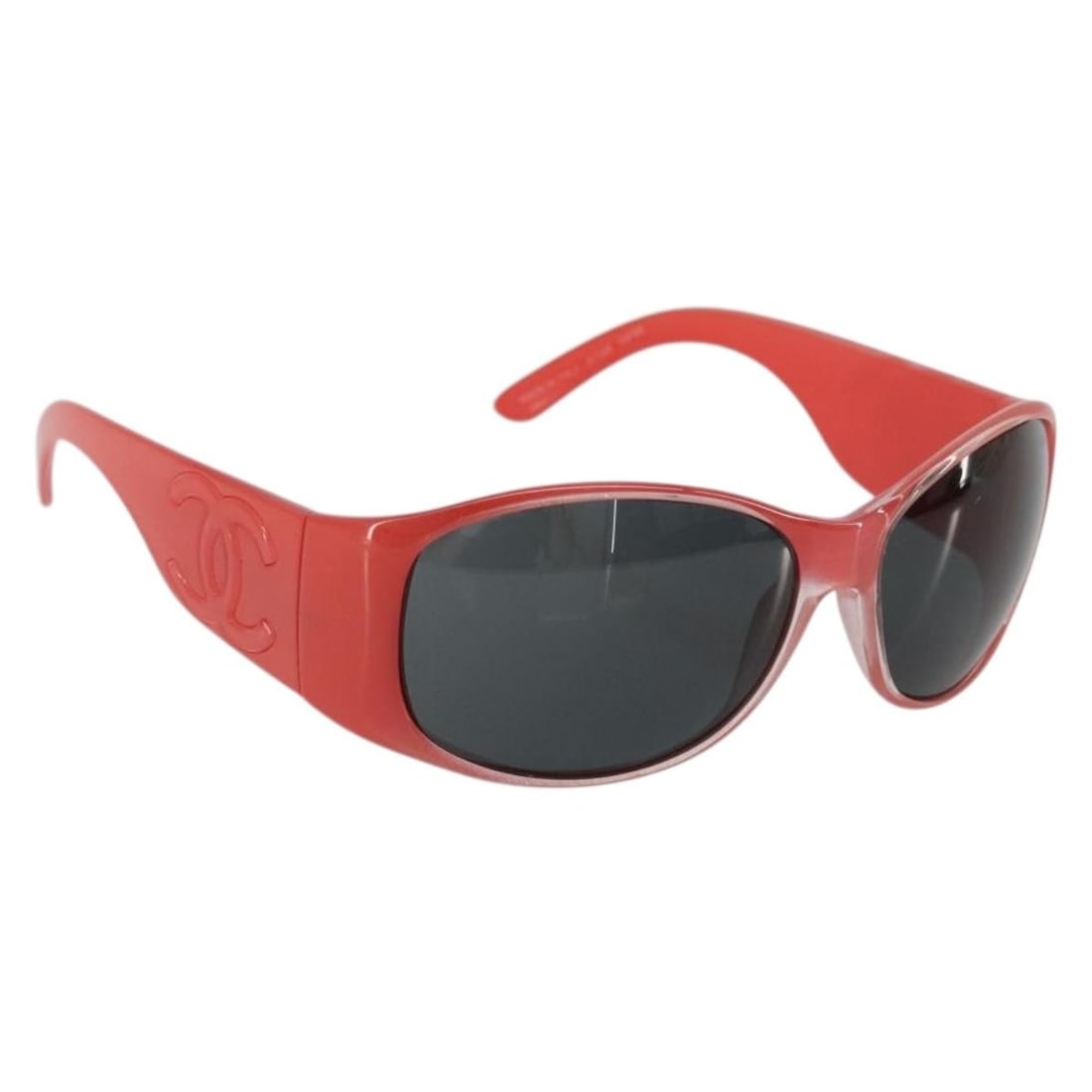 CHANEL Red Plastic Womens Sunglasses Made in Italy: CHANEL Red Plastic Womens Sunglasses Made in Italy Authentic CHANEL women's sunglasses in red plastic with CC detailing. Made in Italy, this pair is offered without the original item box or dust bag; 