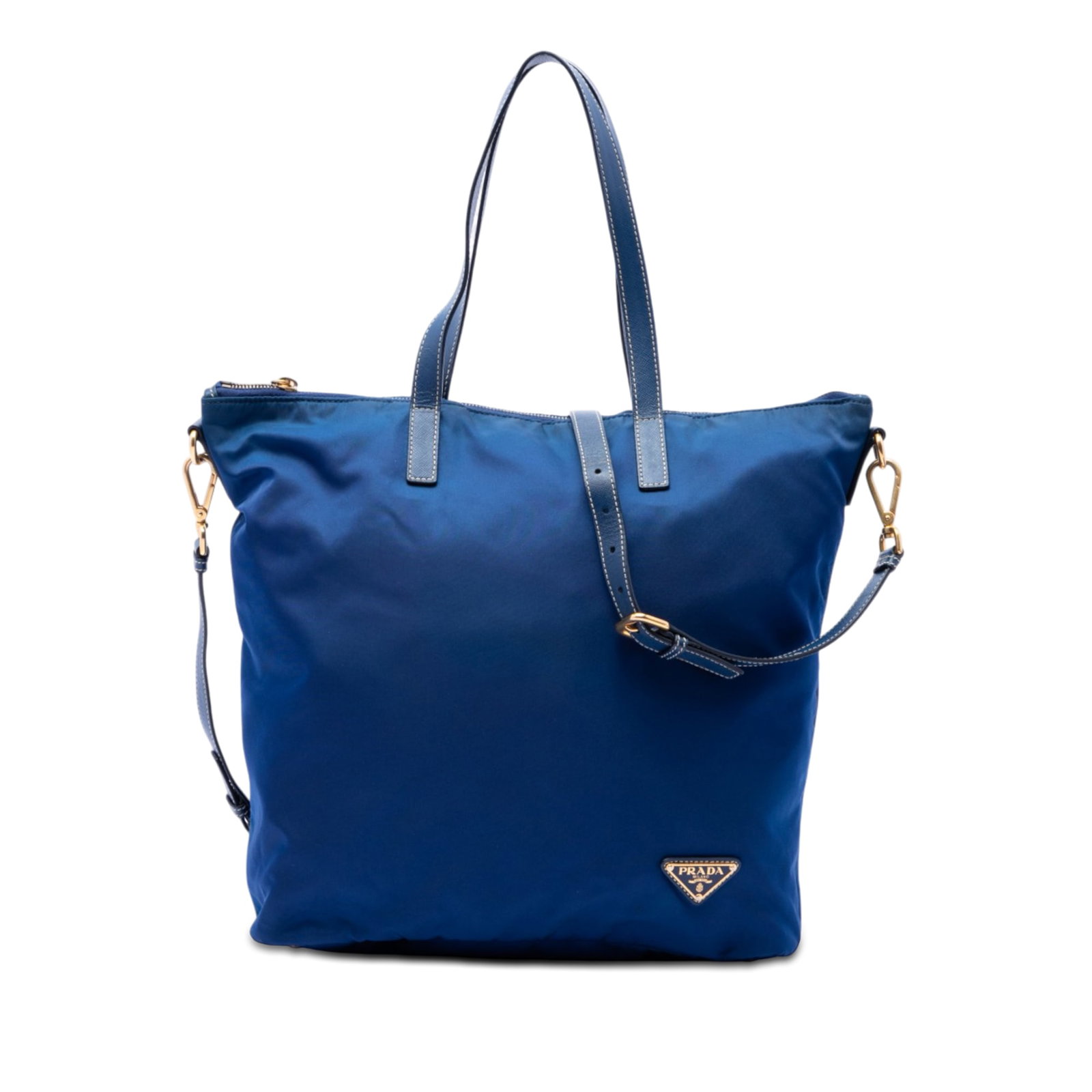 Prada Tessuto Convertible Tote Blue Nylon Satchel: Prada Tessuto Convertible Tote Blue Nylon Satchel Prada Tessuto Zip Top Convertible Tote in blue fabric with flat leather handles, a detachable flat leather strap, top zip closure, and an interior zip