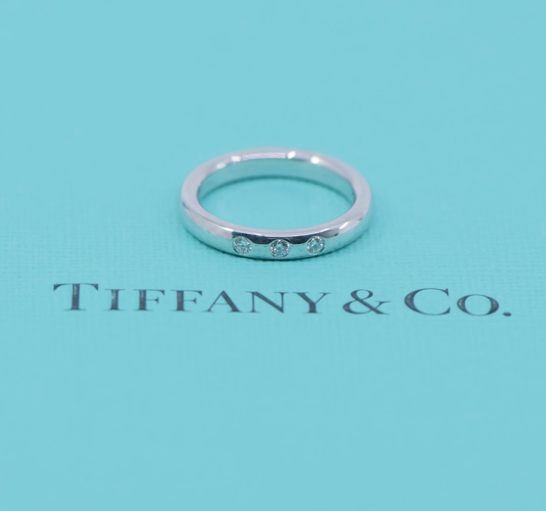 Tiffany & Co Elsa Peretti Diamond Platinum Stacking Ring 3.5: Tiffany & Co Elsa Peretti Diamond Platinum Stacking Ring 3.5 This exquisite Tiffany & Co. Elsa Peretti stacking ring is crafted from high-quality platinum, boasting a metal purity of 950. The ring fea