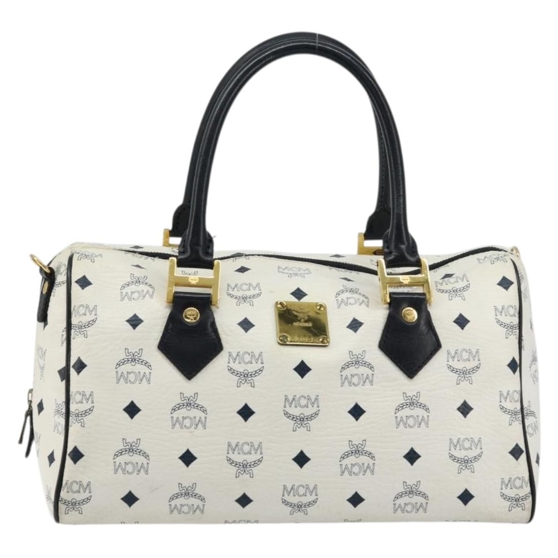 MCM Visetos Logogramme White Leather Handbag: MCM Visetos Logogramme White Leather Handbag MCM Visetos logogramme leather bag in white. This vintage piece is made in Germany and remains in good condition with honest wear consistent with age and u