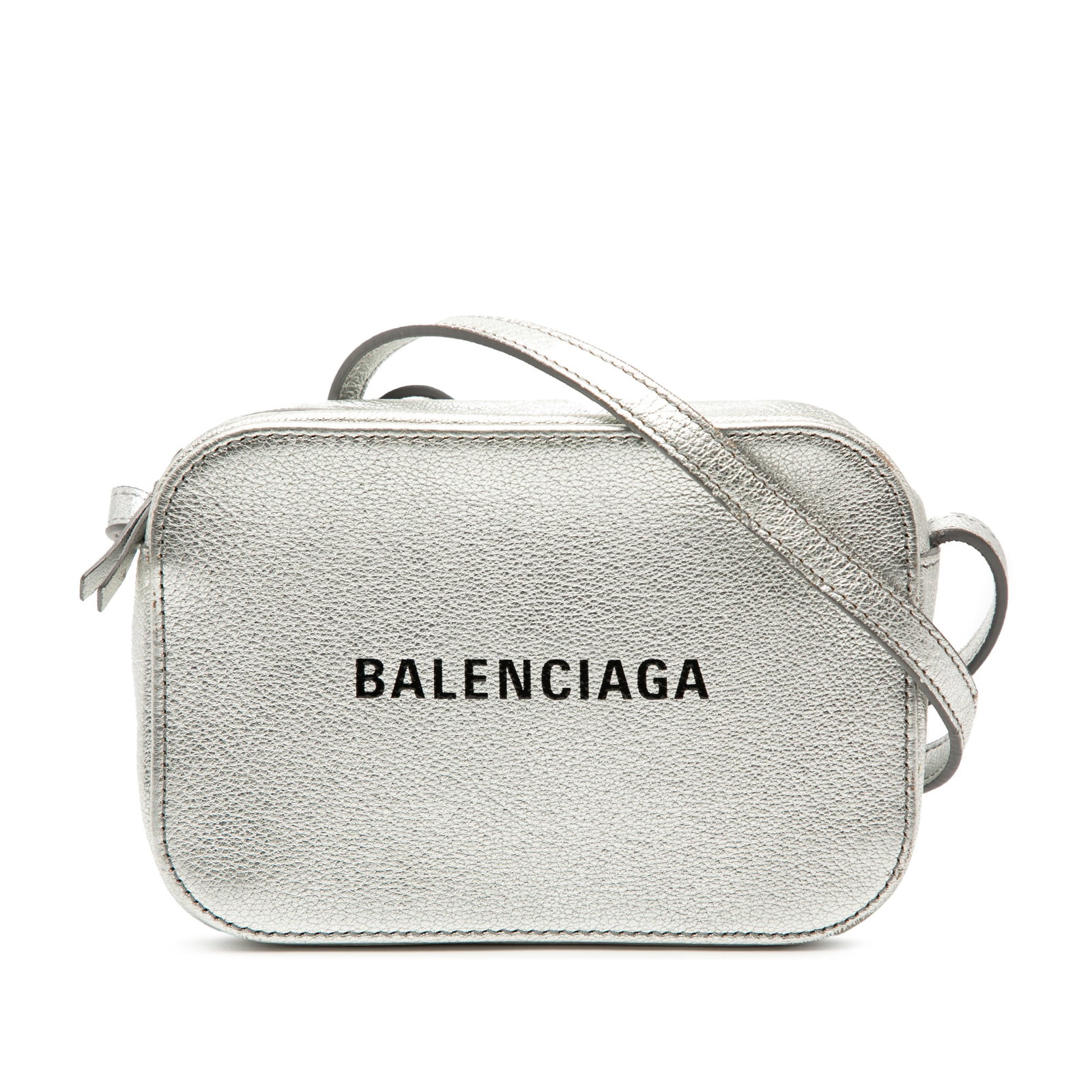 Balenciaga Everyday XS Silver Metallic Leather Camera Crossbody Bag: Balenciaga Everyday XS Silver Metallic Leather Camera Crossbody Bag This Balenciaga XS Metallic Leather Everyday Camera Bag features a silver leather body with a metallic finish, an adjustable flat le