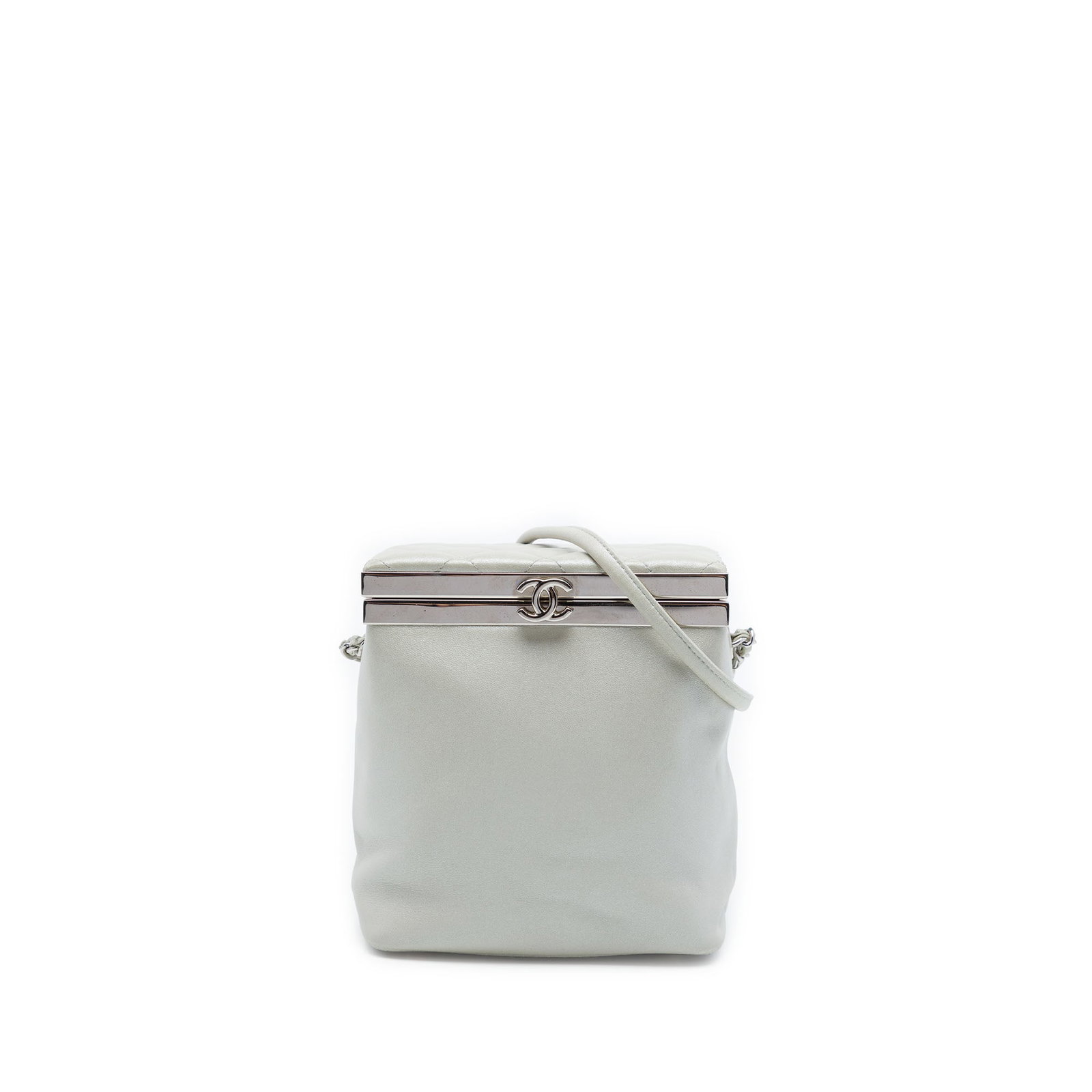 Chanel CC Vanity Bag Metallic Calfskin Leather White: Chanel CC Vanity Bag Metallic Calfskin Leather White A Chanel CC Metallic Calfskin Vanity Bag in white metallic leather, made in Italy. It features a leather-woven chain link and rolled leather strap,