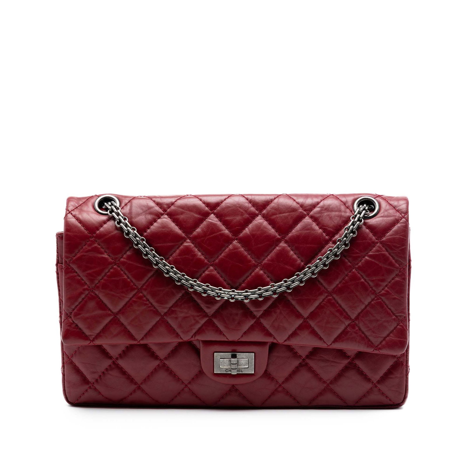Chanel Reissue 2.55 226 quilted aged calfskin shoulder bag: Chanel Reissue 2.55 226 quilted aged calfskin shoulder bag Chanel Reissue 2.55 Double Flap 226 shoulder bag in red quilted aged calfskin. This bag features silver-tone chain shoulder straps, double fr
