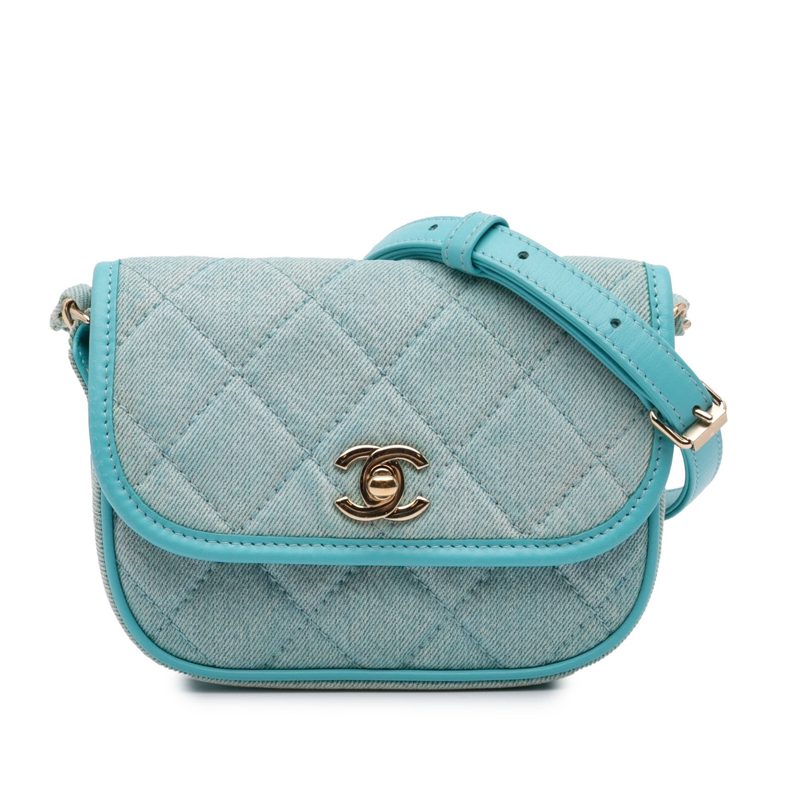 Chanel Mini Messenger Blue Quilted Denim Crossbody Bag with CC Flap: Chanel Mini Messenger Blue Quilted Denim Crossbody Bag with CC Flap This Chanel Mini CC Quilted Denim Messenger Flap features a quilted blue denim body with leather trim, a denim-woven chain strap wit