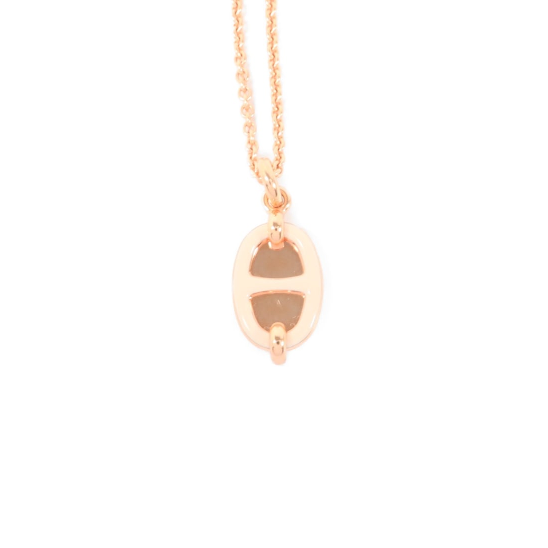 Hermes Mini Malillon Metal Pendant Necklace Gold White: Hermes Mini Malillon Metal Pendant Necklace Gold White Pendant necklace featuring a gold and white colorway with a metal construction. It comes with a storage box and storage bags. Condition is AB: Ve