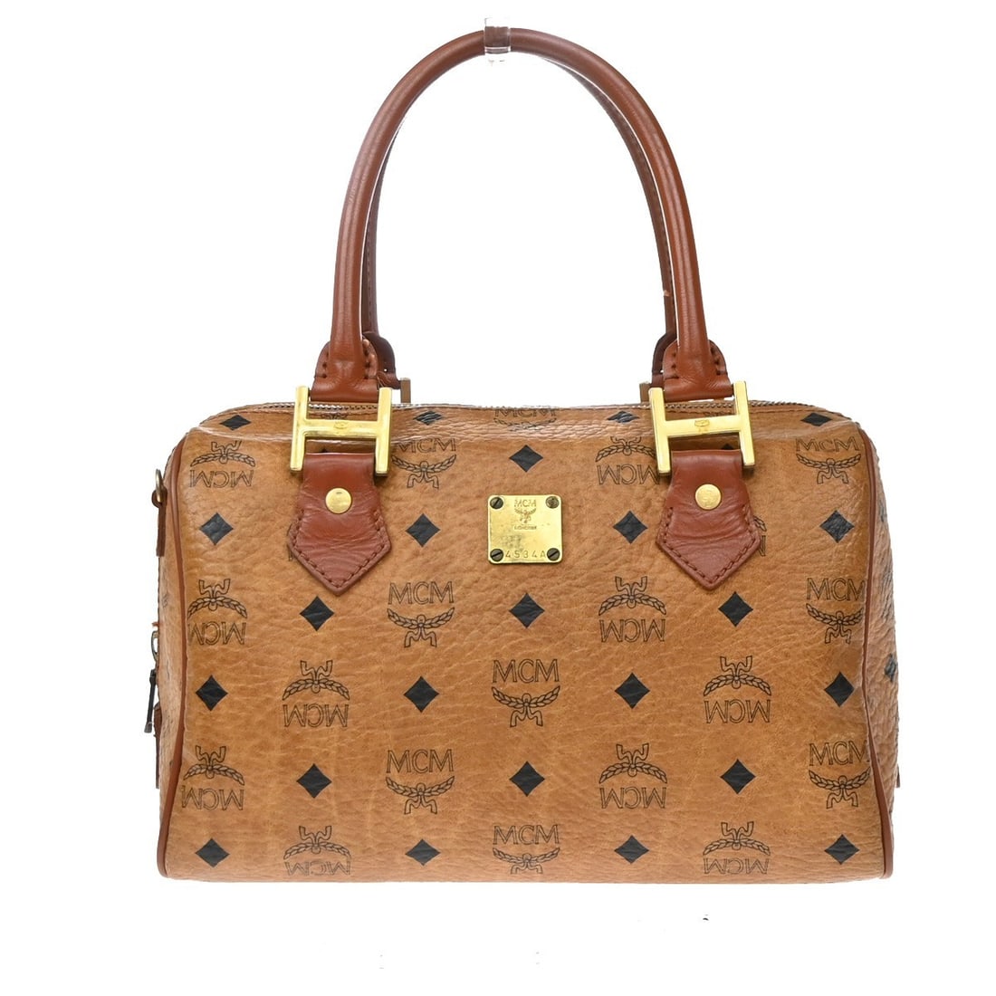 MCM Visetos Logogramme Brown Leather Handbag 26cm: MCM Visetos Logogramme Brown Leather Handbag 26cm MCM Visetos logogramme item in brown leather with a structured silhouette and a good overall condition. The exterior shows light scuffs, dirt, light
