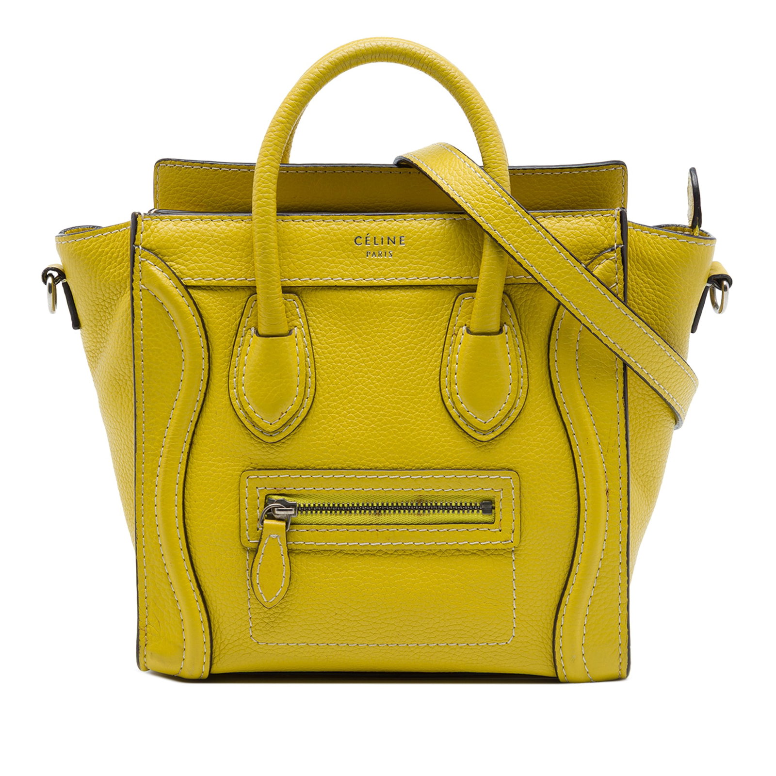 Celine Nano Luggage Tote in Yellow Grained Calfskin Leather: Celine Nano Luggage Tote in Yellow Grained Calfskin Leather Celine Nano Grained Calfskin Luggage Tote in yellow leather. This tote features rolled leather handles, a detachable flat leather strap, a t