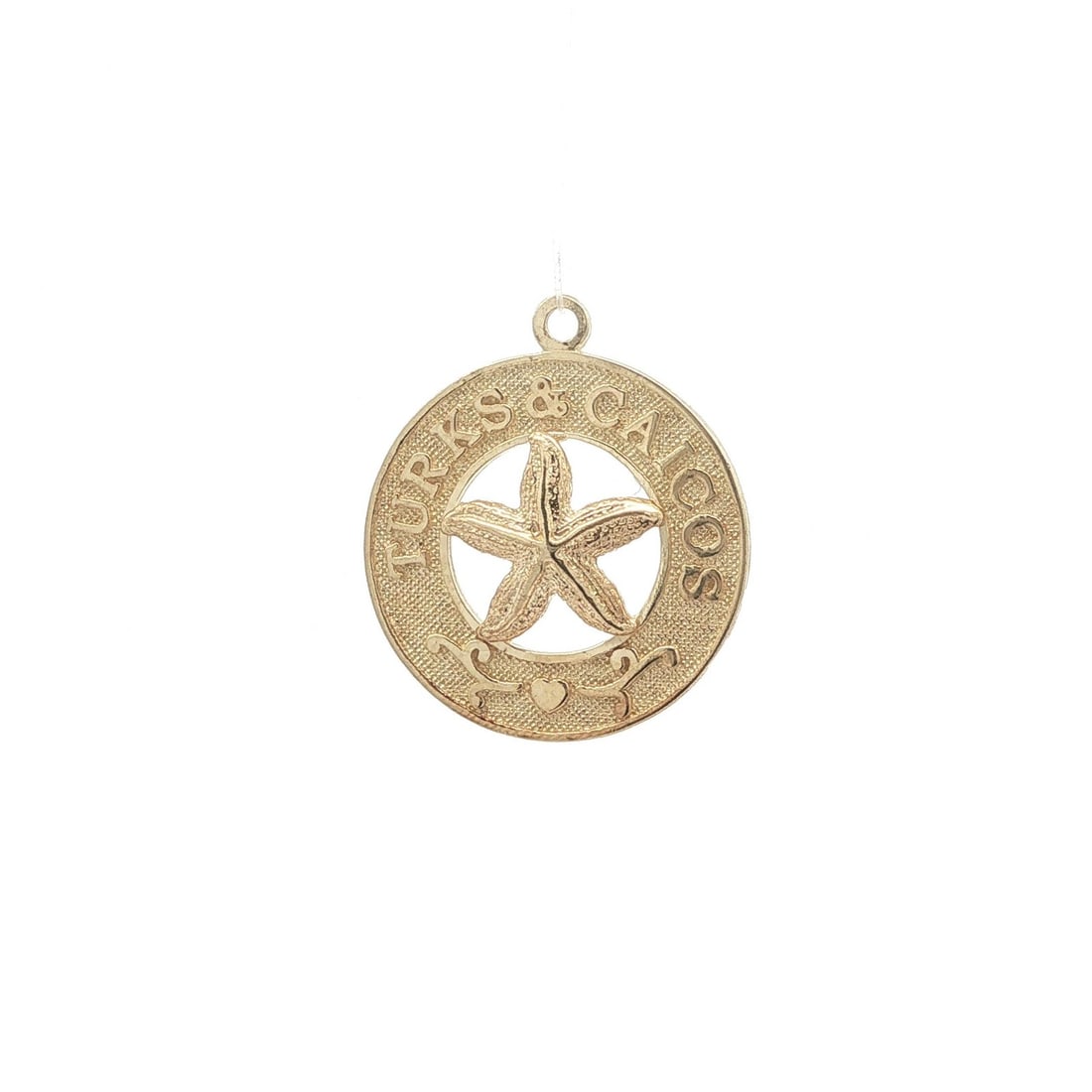 Unbranded 14k Yellow Gold Turks and Caicos Starfish Charm: Unbranded 14k Yellow Gold Turks and Caicos Starfish Charm Vintage collectible starfish charm pendant crafted in solid 14k yellow gold. This detailed Turks & Caicos themed piece has no main stone and r