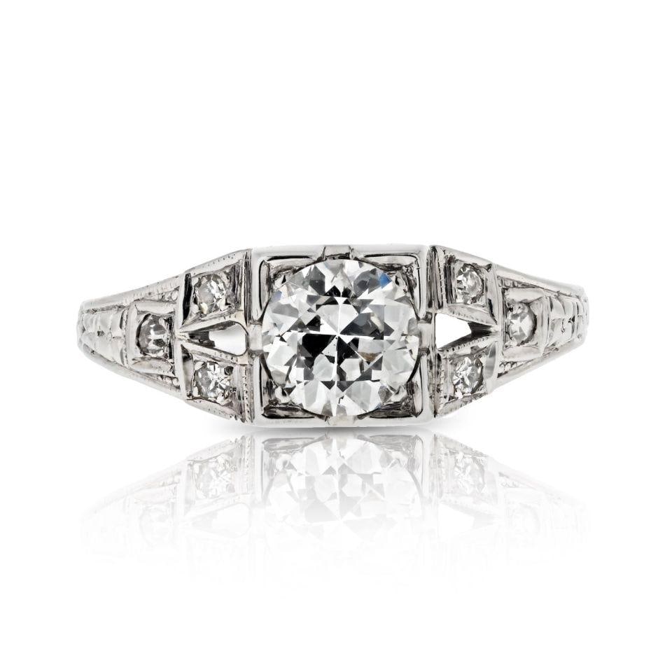 Estate 18K White Gold Engagement Ring with 0.85 Ct Old European Diamond: Estate 18K White Gold Engagement Ring with 0.85 Ct Old European Diamond Estate engagement ring crafted in 18K white gold and centered with a 0.85 ct Old European cut diamond. This pre-owned ring offer