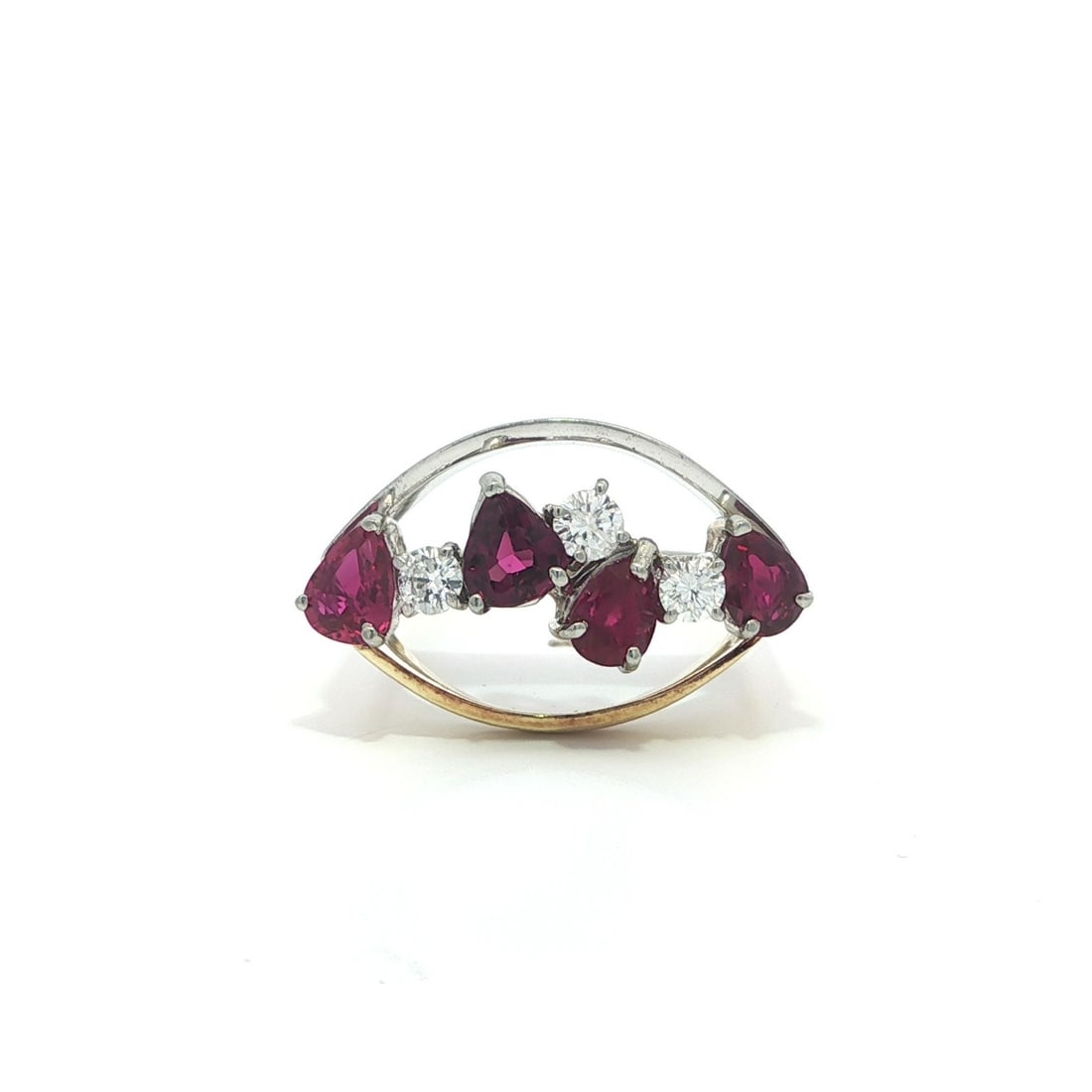 Open East West Band Ring in 14k Yellow Gold with Pear Rubies and Diamonds: Open East West Band Ring in 14k Yellow Gold with Pear Rubies and Diamonds This elegant band ring is crafted in solid 14k yellow and white gold, featuring four natural pear-cut rubies with a combined w
