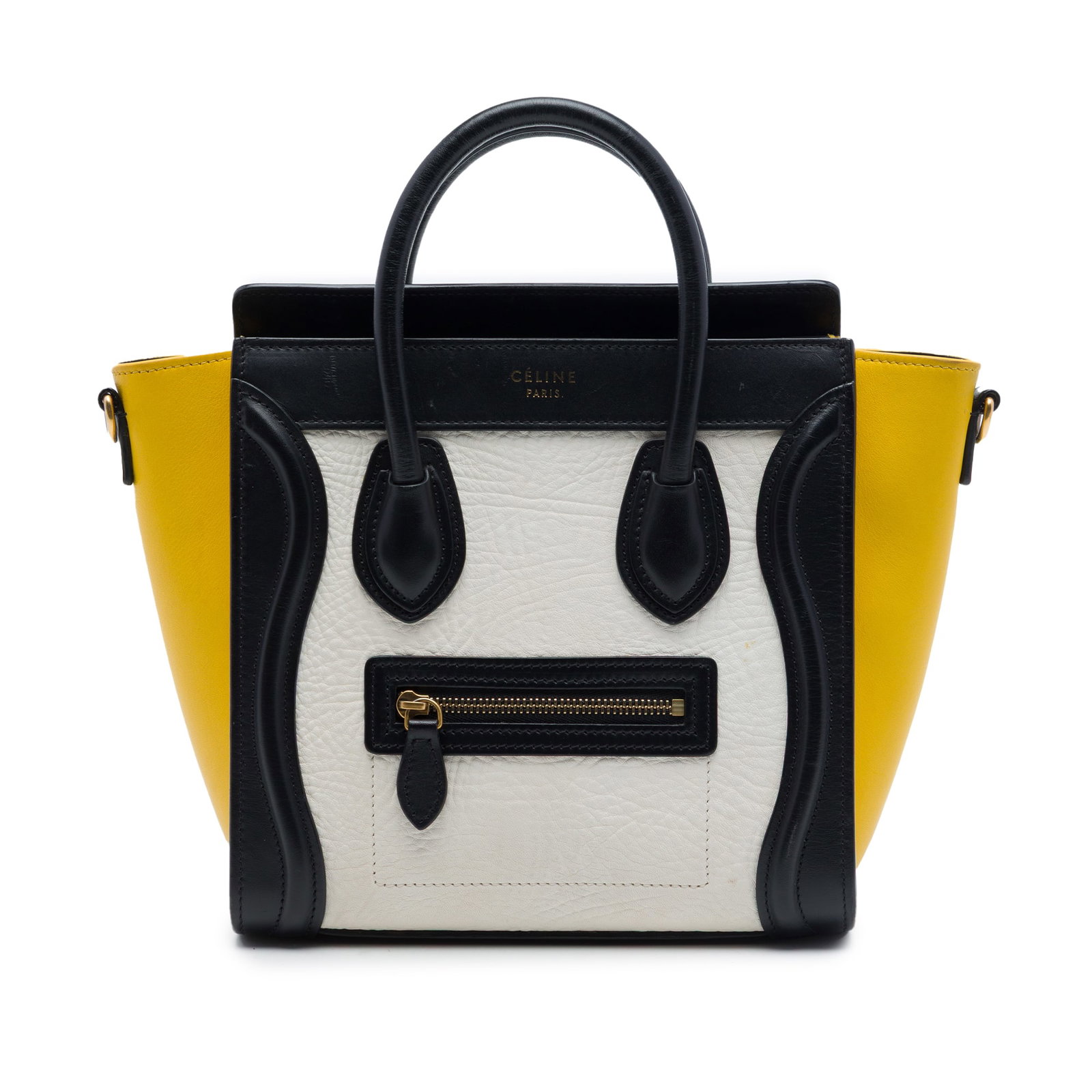 Celine Nano Luggage Tote in Tricolor Nubuck and Calfskin: Celine Nano Luggage Tote in Tricolor Nubuck and Calfskin Celine Nano Tricolor Luggage Tote crafted with a calf leather body and nubuck leather side panels. This structured tote features rolled leather
