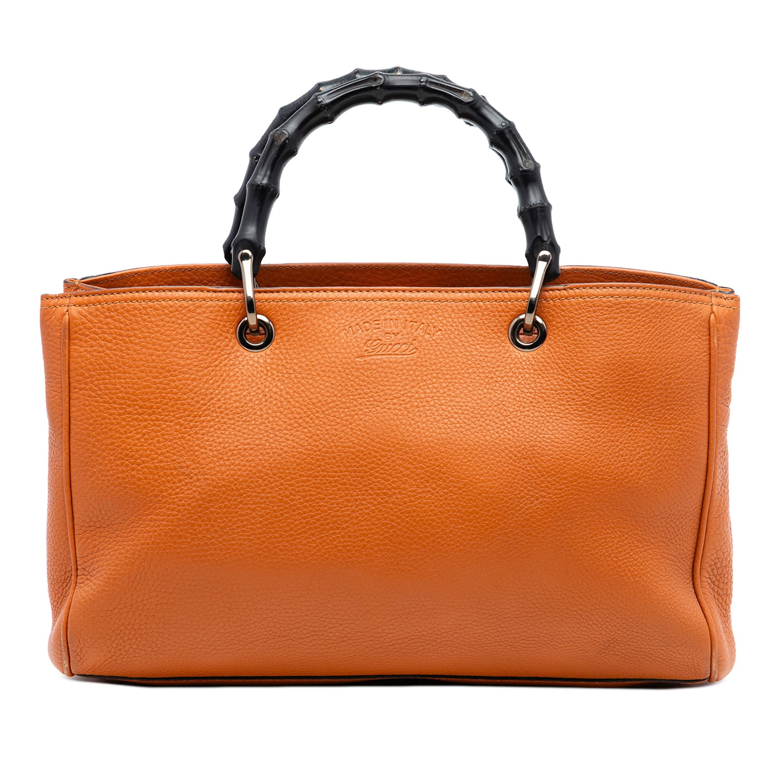 Medium Bamboo Handle Orange Leather Satchel by Gucci: Medium Bamboo Handle Orange Leather Satchel by Gucci This Gucci Medium Calfskin Bamboo Shopper Satchel features a leather exterior in orange with signature bamboo top handles. The satchel is designed 