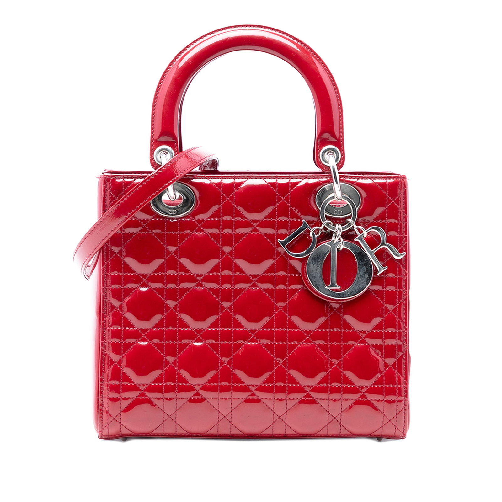 Dior red patent leather Lady Dior medium bag: Dior red patent leather Lady Dior medium bag This Medium Patent Cannage Lady Dior bag features a striking red patent leather exterior with signature cannage stitching. It is designed with flat leather