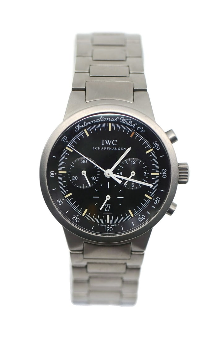 IWC GST Chronograph Titanium Watch IW372701 with Box and Papers: IWC GST Chronograph Titanium Watch IW372701 with Box and Papers Experience the elegance and precision of the IWC GST Chronograph Titanium Watch IW372701. This pre-owned wristwatch features a robust ti