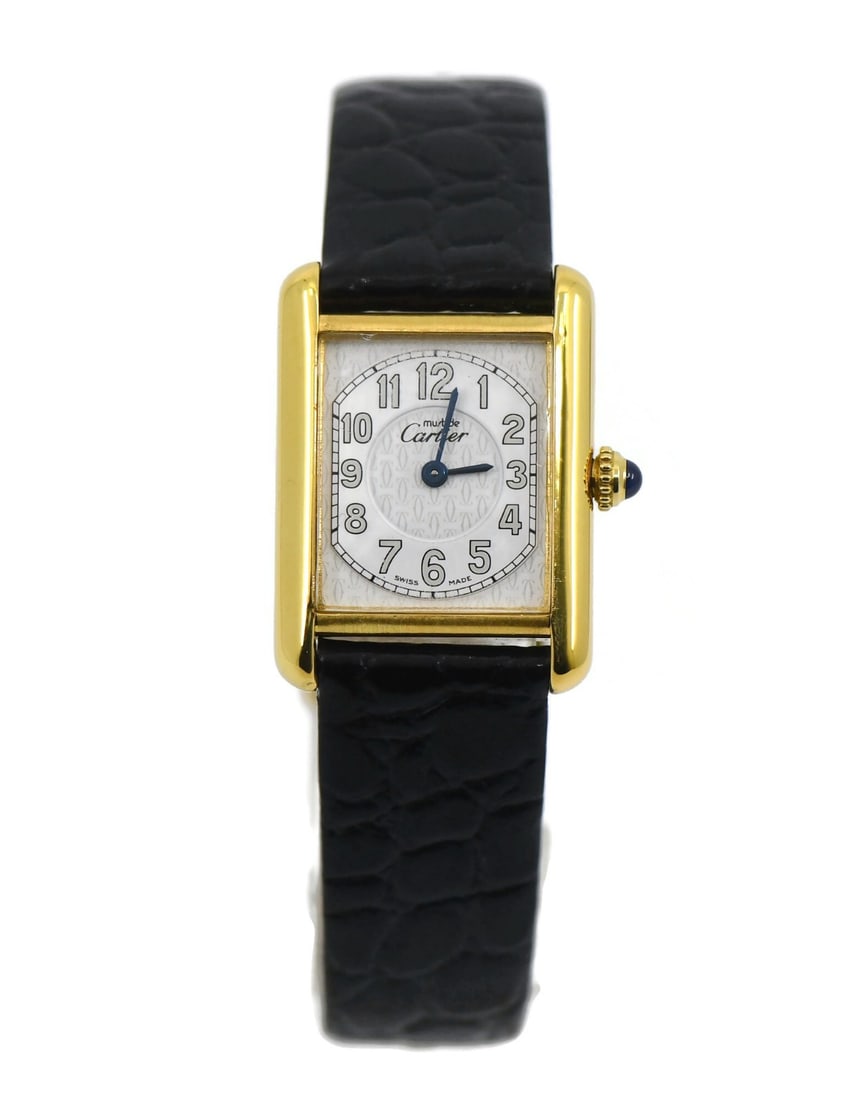Sterling Silver Cartier Tank Must Quartz Ref 2415 Leather Band Watch: Sterling Silver Cartier Tank Must Quartz Ref 2415 Leather Band Watch This Cartier Tank Must wristwatch features a sterling silver case and an analog display. The watch is powered by a quartz movement 