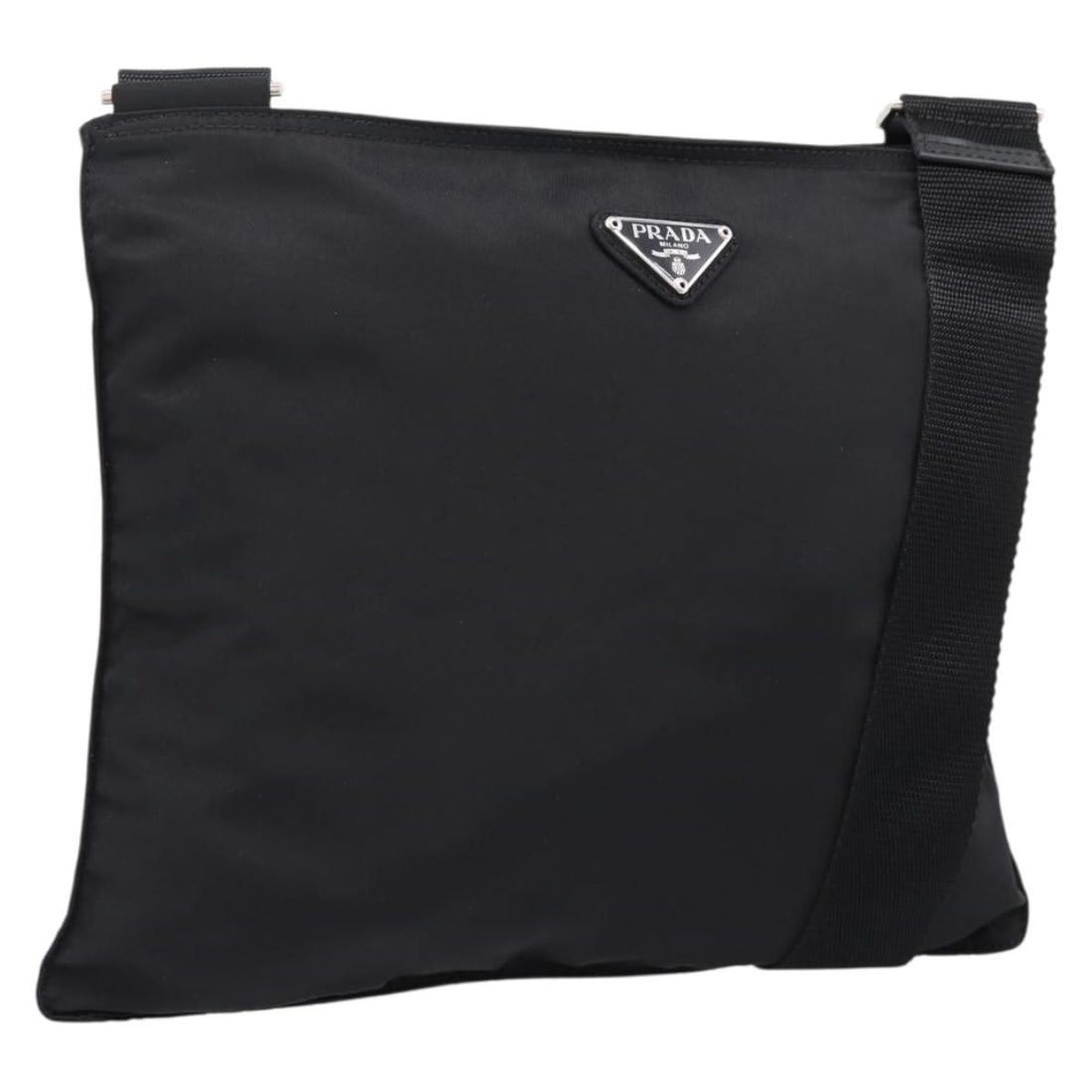 PRADA B7338 Black Nylon Shoulder Bag with Guarantee Card: PRADA B7338 Black Nylon Shoulder Bag with Guarantee Card Authentic Prada shoulder bag in black nylon with silver-tone accents. This women's bag includes the guarantee card and is made in Italy. Condit