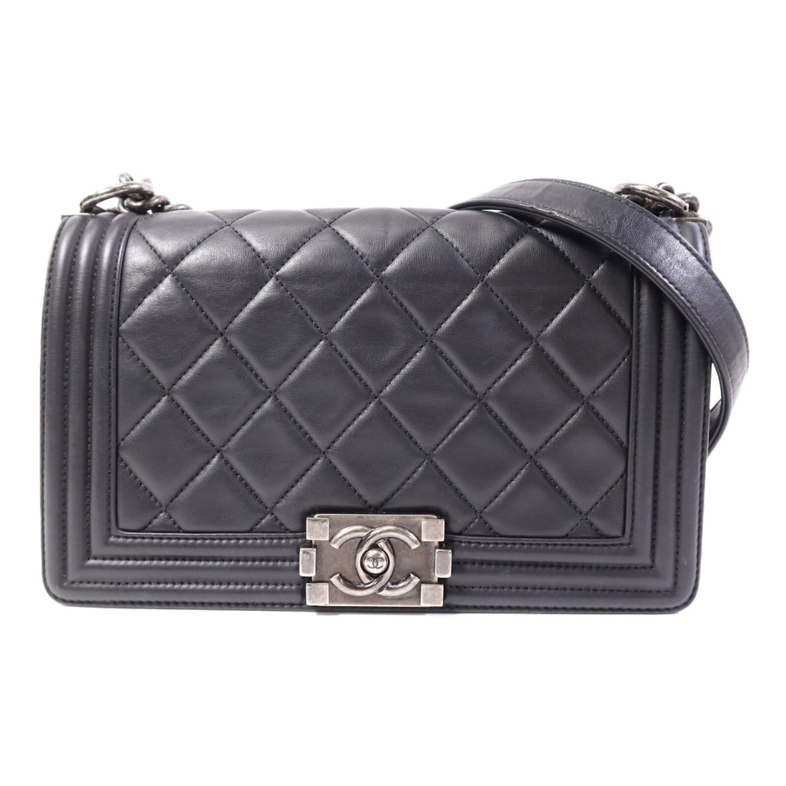 CHANEL Boy 25 Black Calfskin Shoulder Bag with SHW: CHANEL Boy 25 Black Calfskin Shoulder Bag with SHW CHANEL Boy 25 shoulder bag in black calfskin leather with silver-tone hardware. This unisex shoulder bag features a turn-lock closure, one open inter