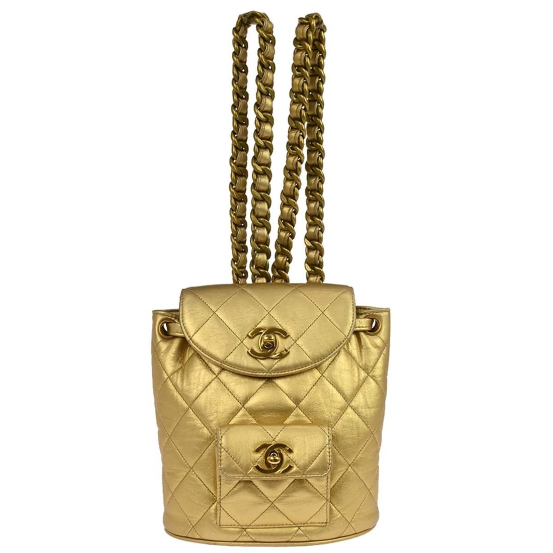 CHANEL Duma Mini Drawstring Backpack Gold Lambskin Chain Strap: CHANEL Duma Mini Drawstring Backpack Gold Lambskin Chain Strap Small Chanel Duma backpack in gold lambskin with a drawstring closure, logo accents, and chain strap. The interior is leather-lined in go