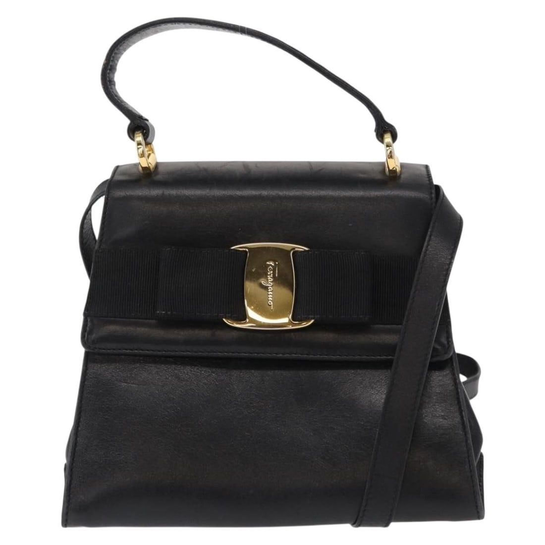 Salvatore Ferragamo Leather Vintage Vara Bow Top Handle Purse: Salvatore Ferragamo Leather Vintage Vara Bow Top Handle Purse This pre-owned Salvatore Ferragamo Vintage Vara Bow top handle bag for women features black leather construction with a signature bow deta