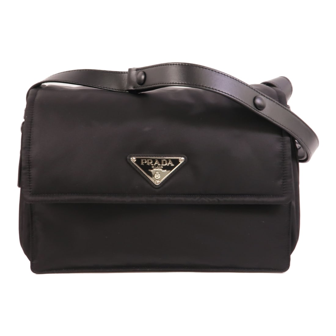 PRADA Medium Padded Nylon Shoulder Bag in Black: PRADA Medium Padded Nylon Shoulder Bag in Black Medium padded Prada shoulder bag in black nylon with a unisex design. This shoulder bag is made in Italy and features a black exterior with zip pockets 